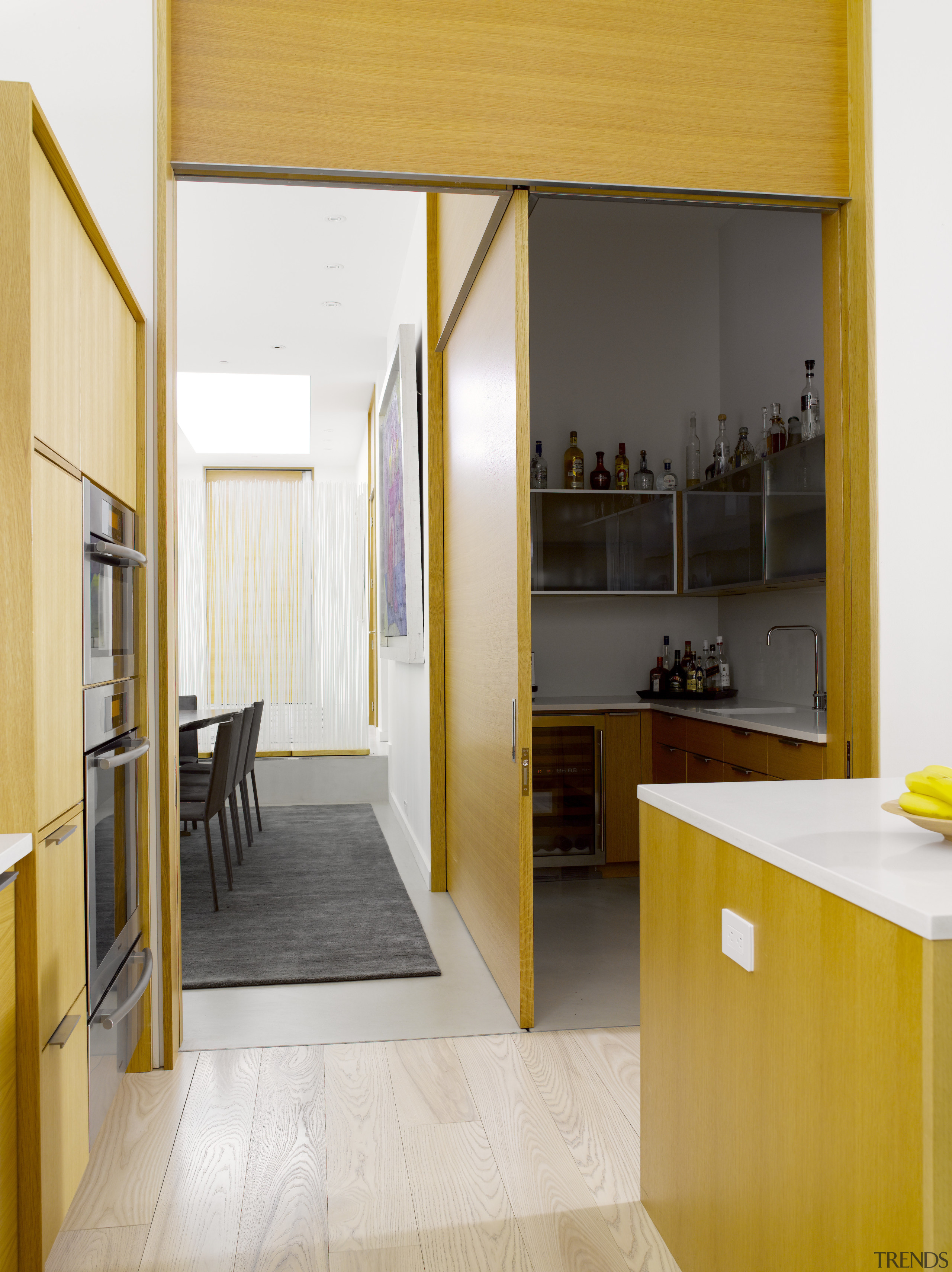 Seen here is a kitchen designed by Geoffrey architecture, cabinetry, door, floor, flooring, house, interior design, kitchen, white, orange