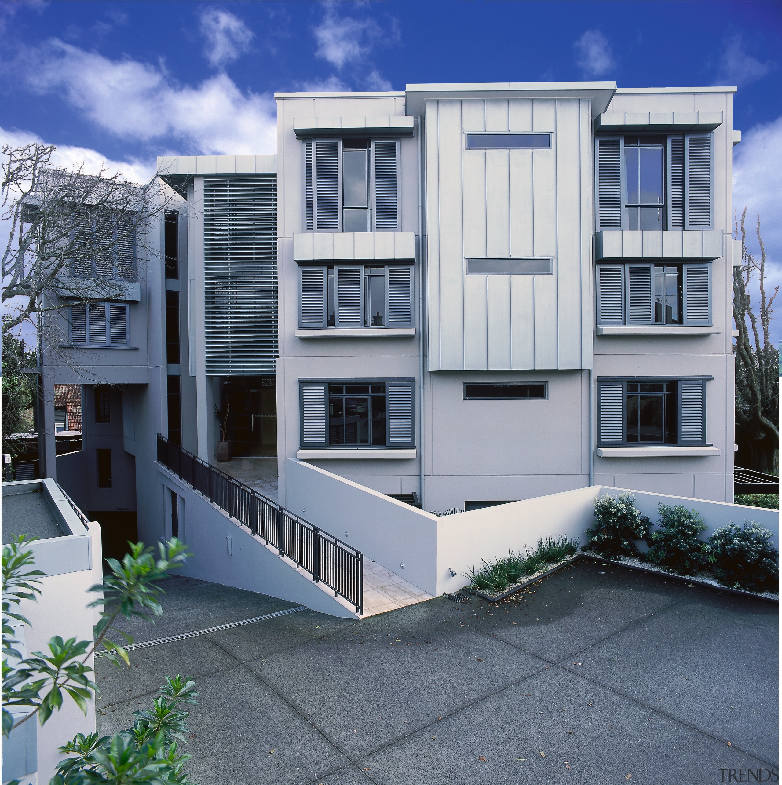 Exterior view of apartment building with concrete cladding architecture, building, commercial building, condominium, elevation, facade, home, house, neighbourhood, property, real estate, residential area, window, gray, blue