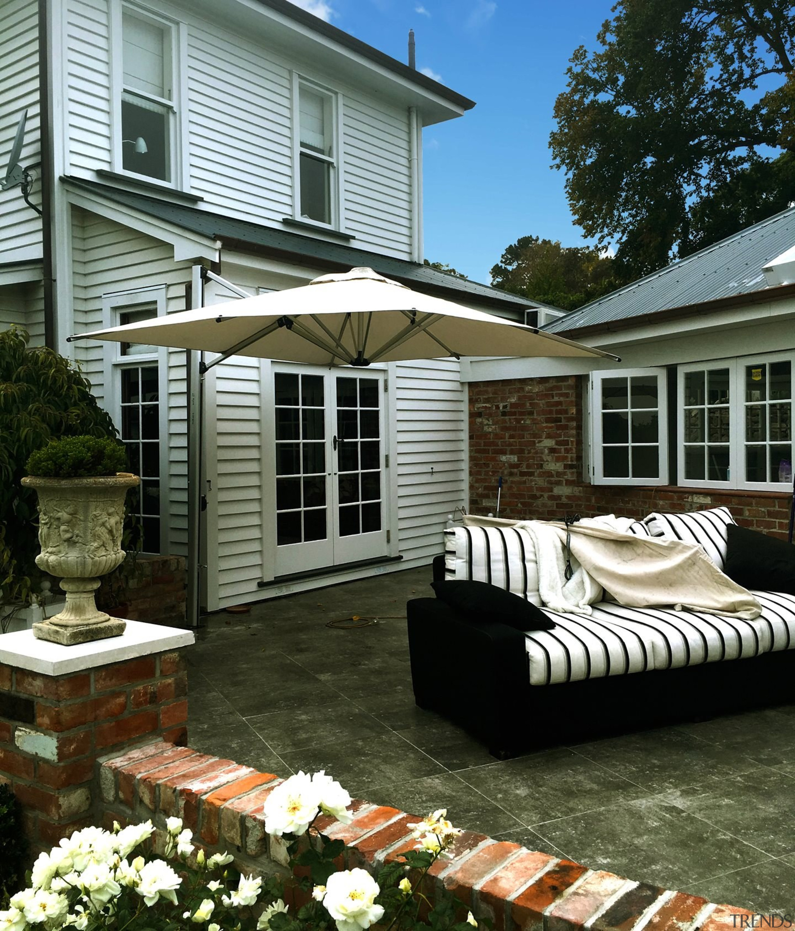 Riviera Cantilever Umbrella - backyard | home | backyard, home, house, outdoor structure, patio, porch, real estate, siding, window, yard, brown
