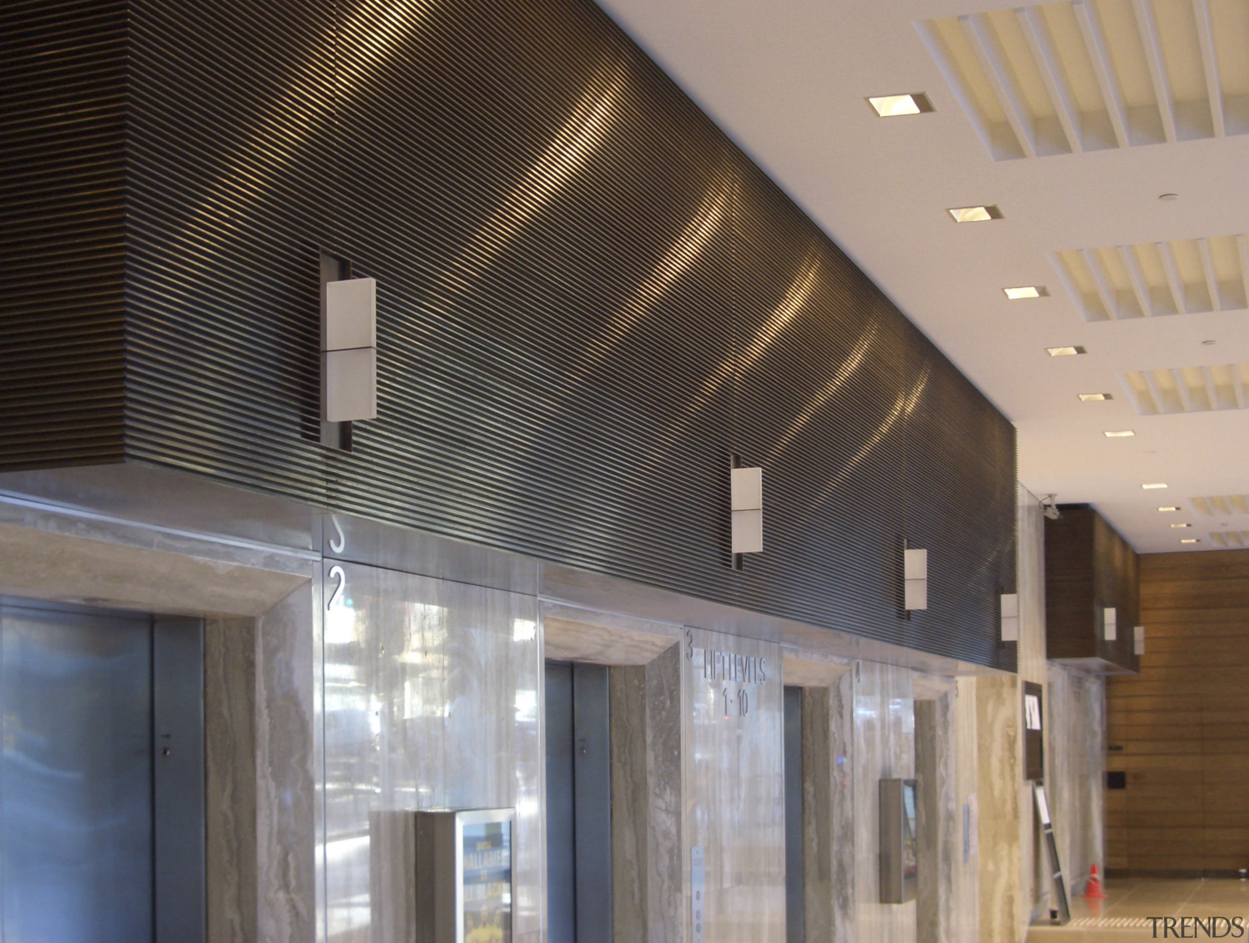 View of brass walls fabricated by Craft Metals architecture, ceiling, daylighting, interior design, lighting, lobby, gray