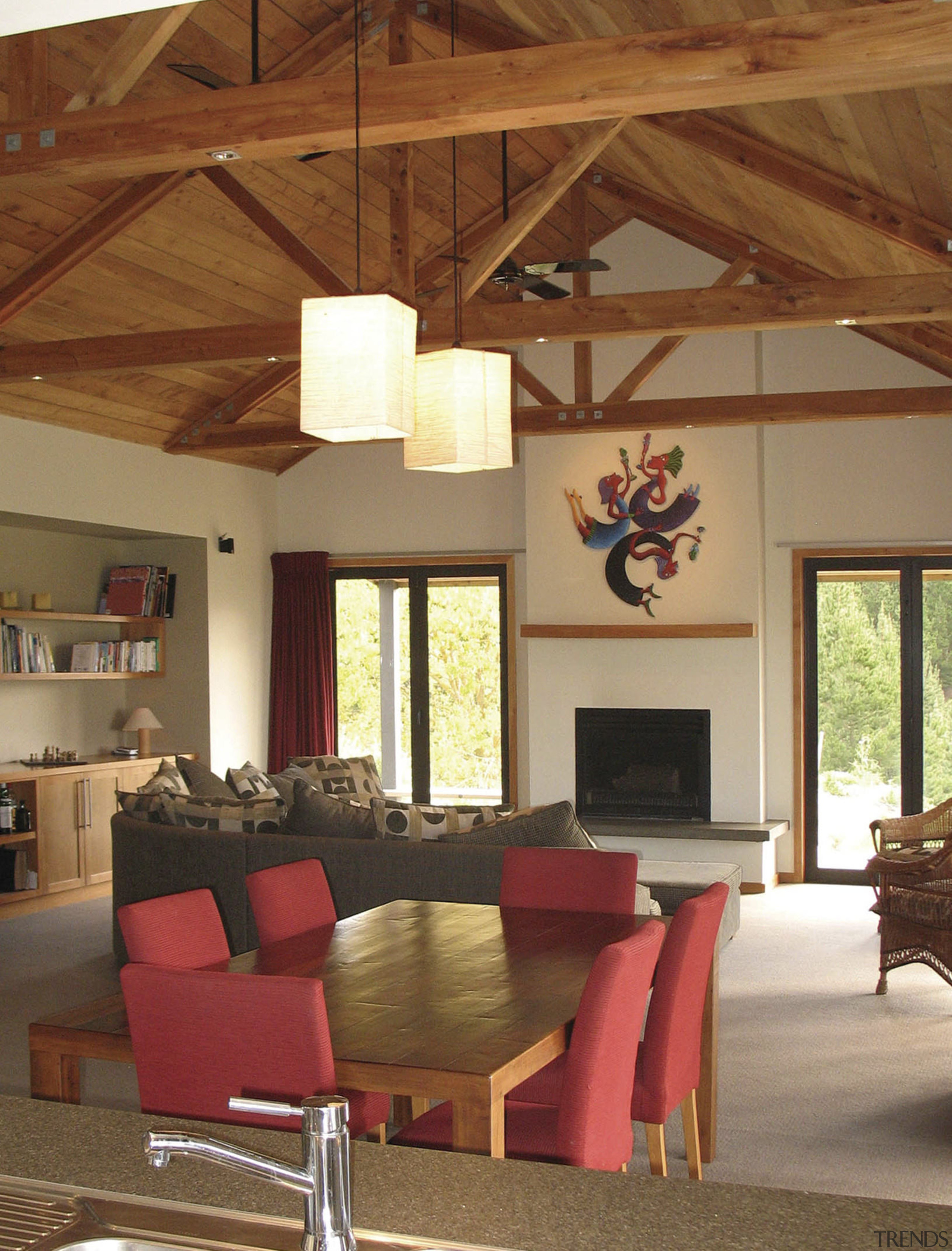 A subtle, country look is created in this beam, ceiling, dining room, home, house, interior design, living room, real estate, room, table, wall, window, wood, brown