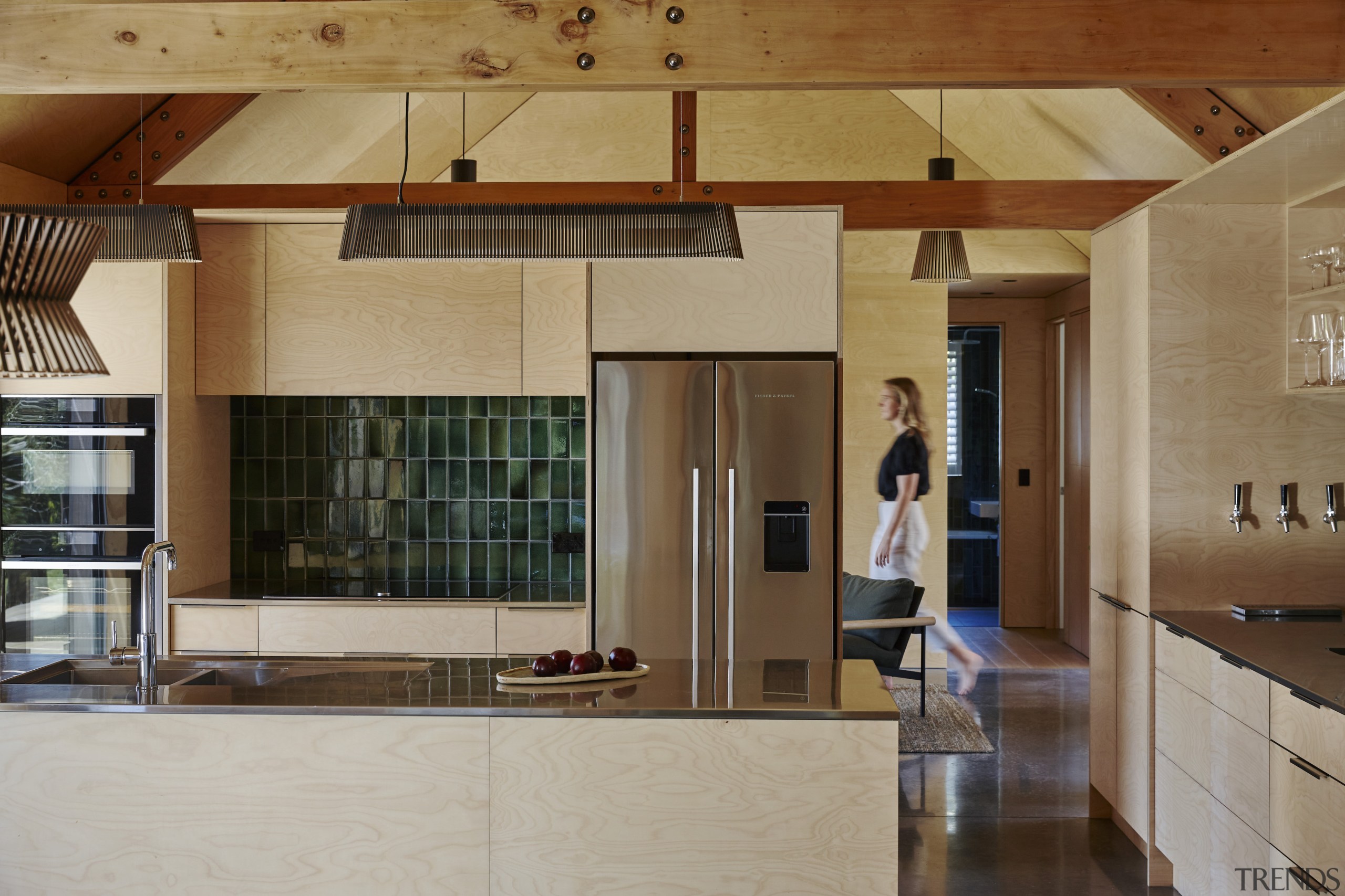 Birch plywood linings and cabinetry bring warmth to 