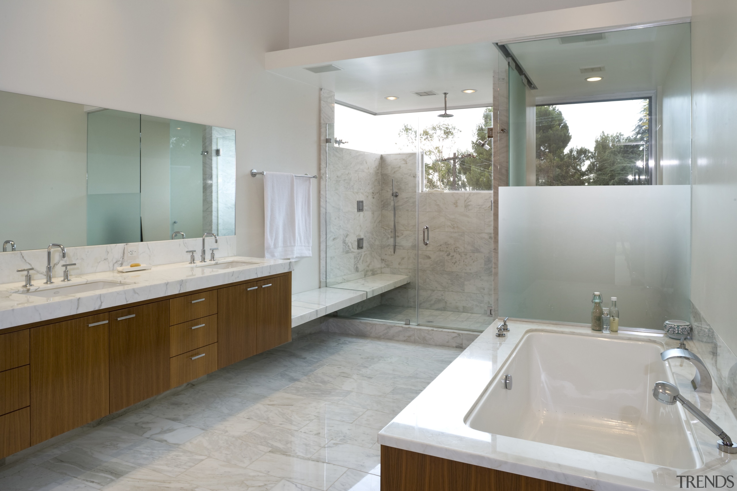 view of master bathroom which features bath tub, bathroom, bathroom cabinet, countertop, estate, home, interior design, property, real estate, room, sink, gray