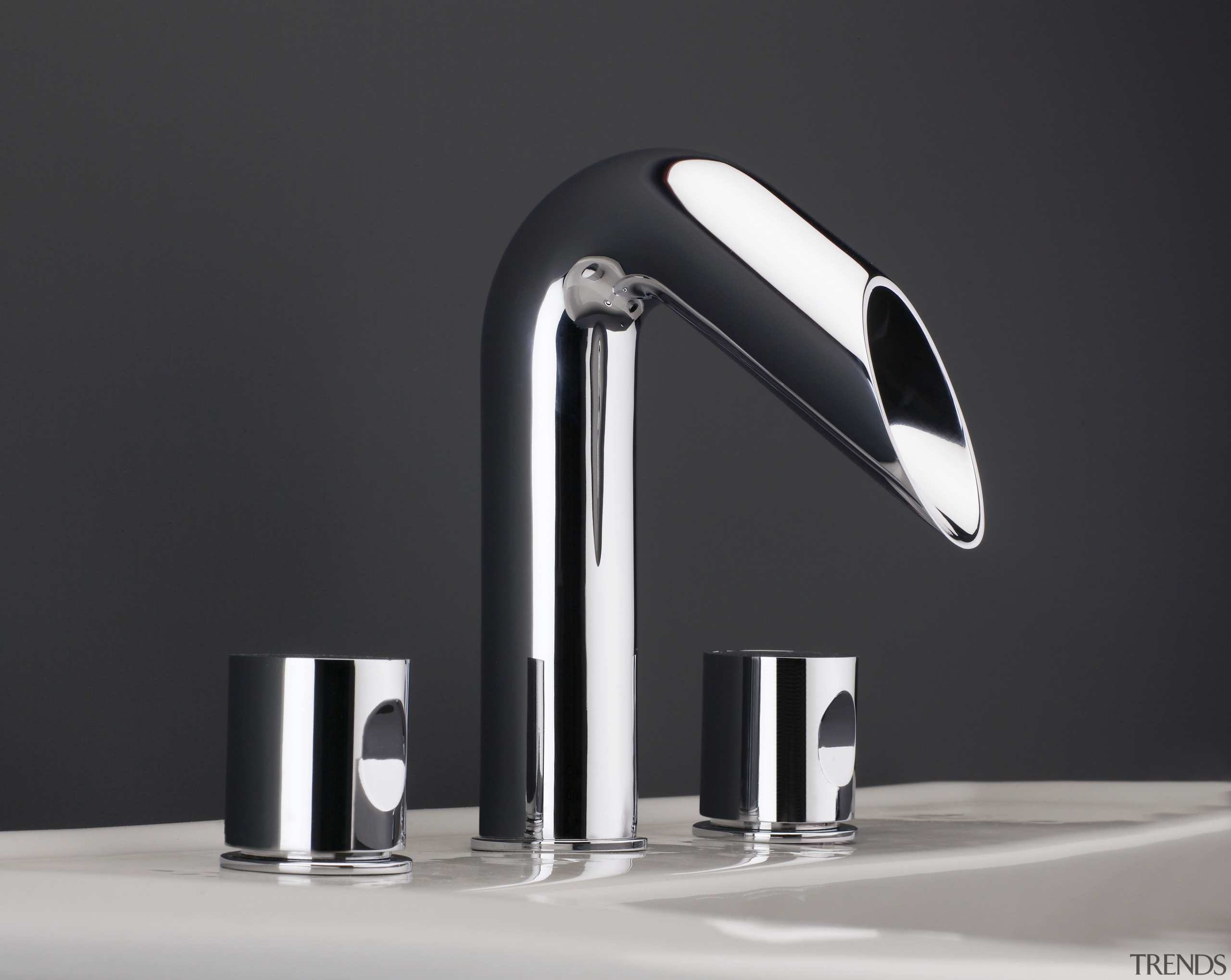 Sleek lines and highly polished chrome finish characterise light fixture, lighting, plumbing fixture, product, product design, tap, black