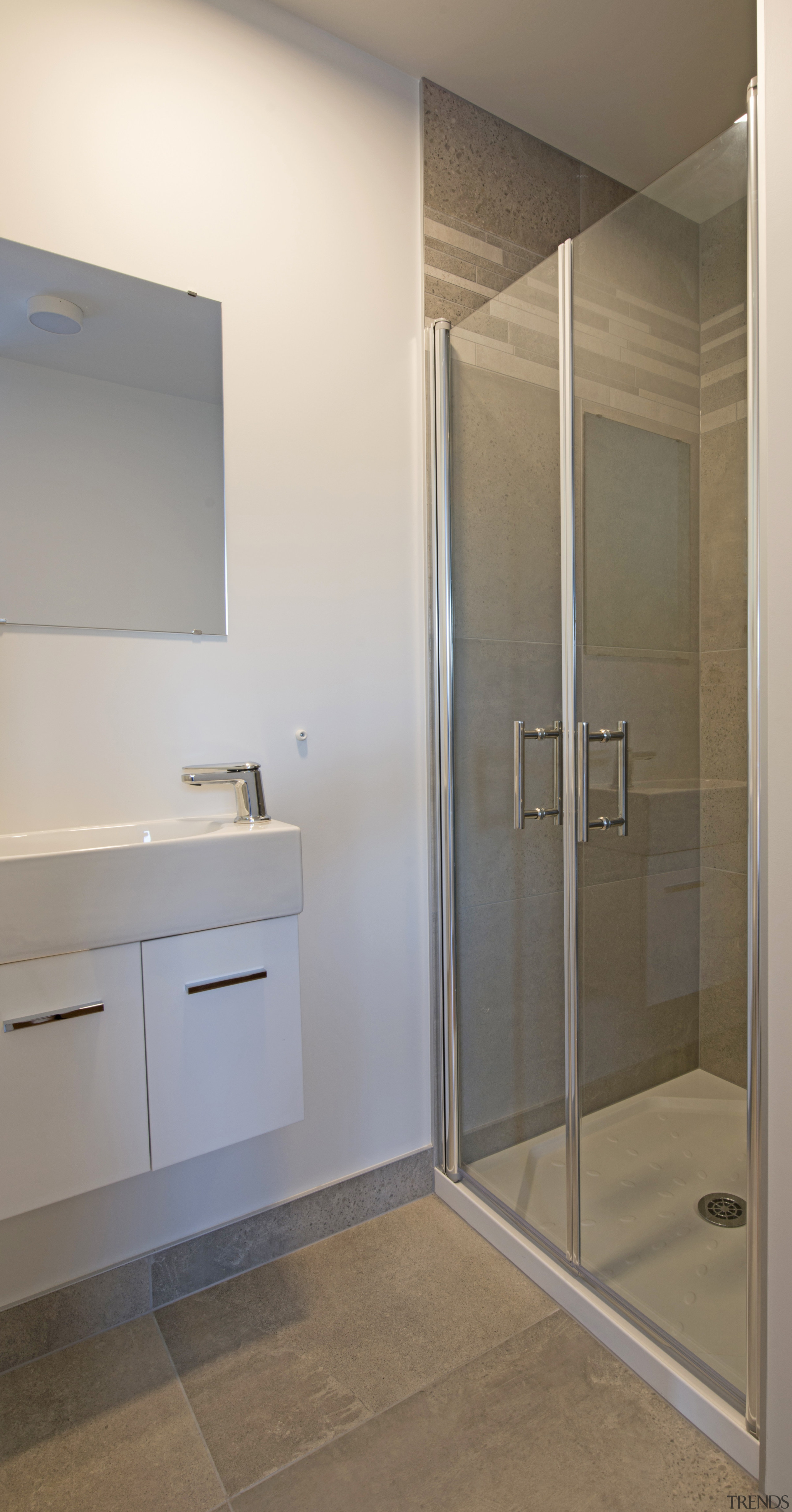 Custom made to fit the shower exactly, the bathroom, floor, interior design, plumbing fixture, room, gray, brown