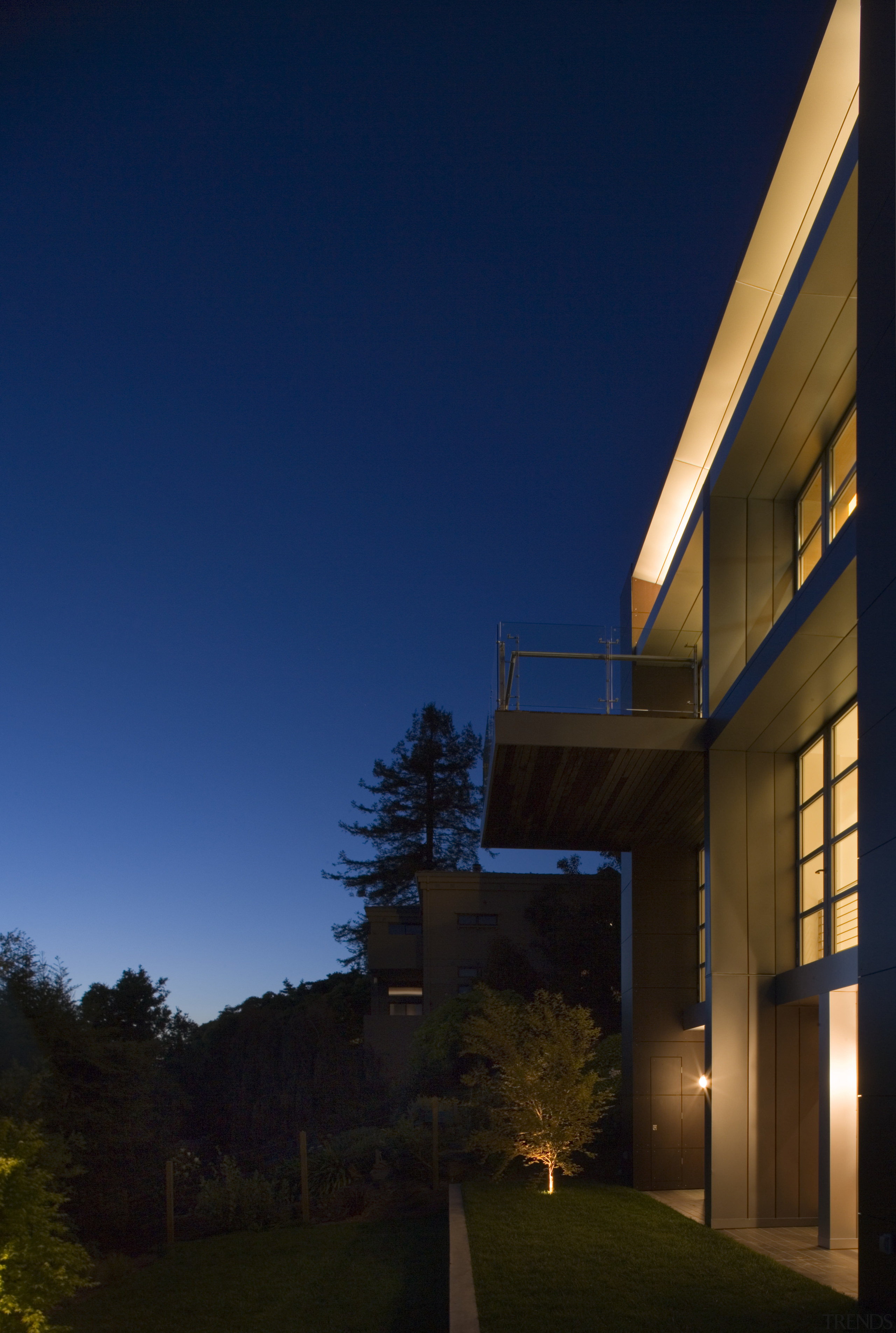 Exterior view of contemporary home with TRESPA siding, architecture, building, cloud, dusk, evening, facade, home, house, lighting, night, real estate, residential area, sky, sunlight, tree, blue