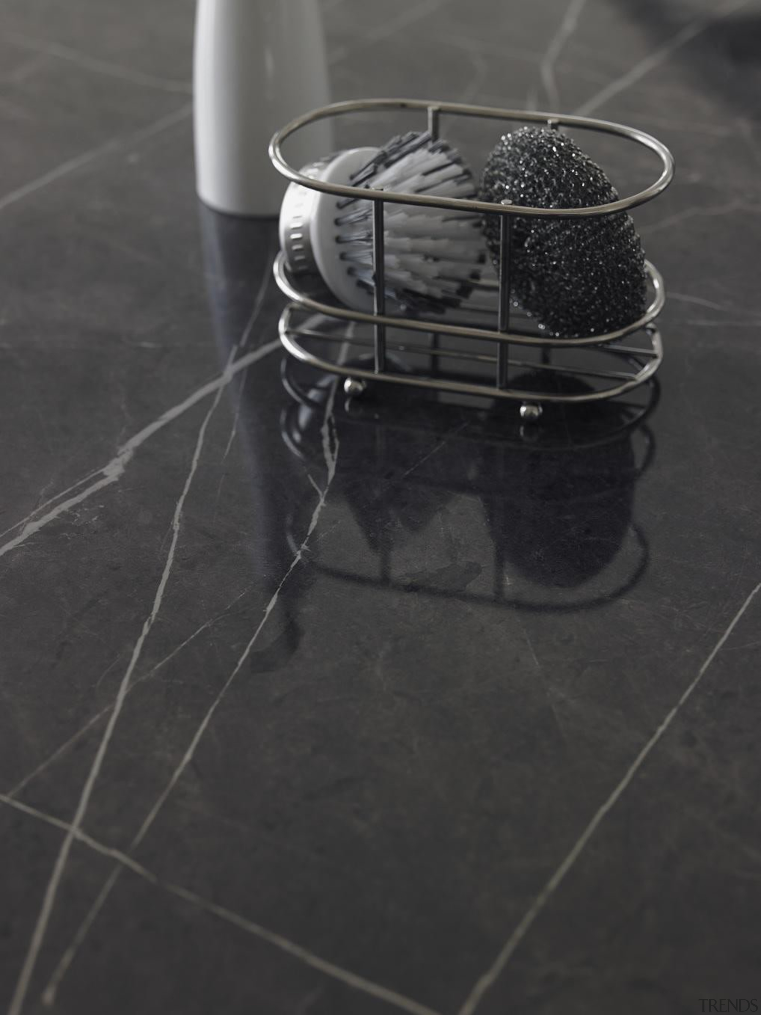 An elegant brown-grey marble with subtle swirls in black, floor, flooring, product, product design, tile, black