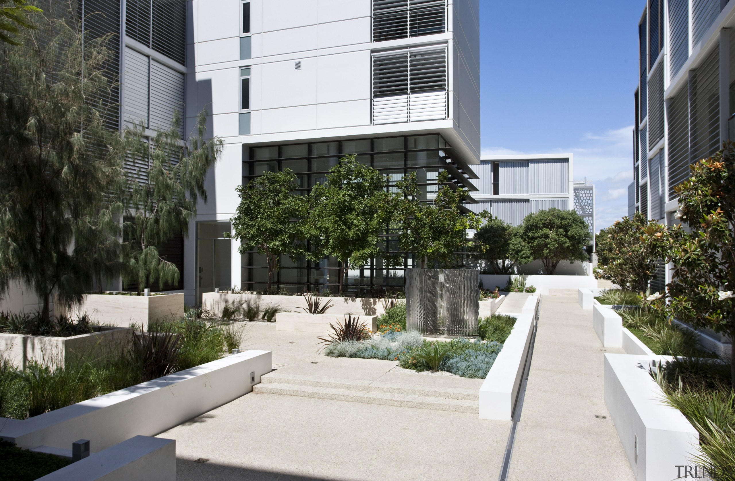 This precinct was developed by Mirvac. Here is apartment, architecture, building, condominium, corporate headquarters, courtyard, mixed use, neighbourhood, property, real estate, residential area, roof, urban design, walkway, white