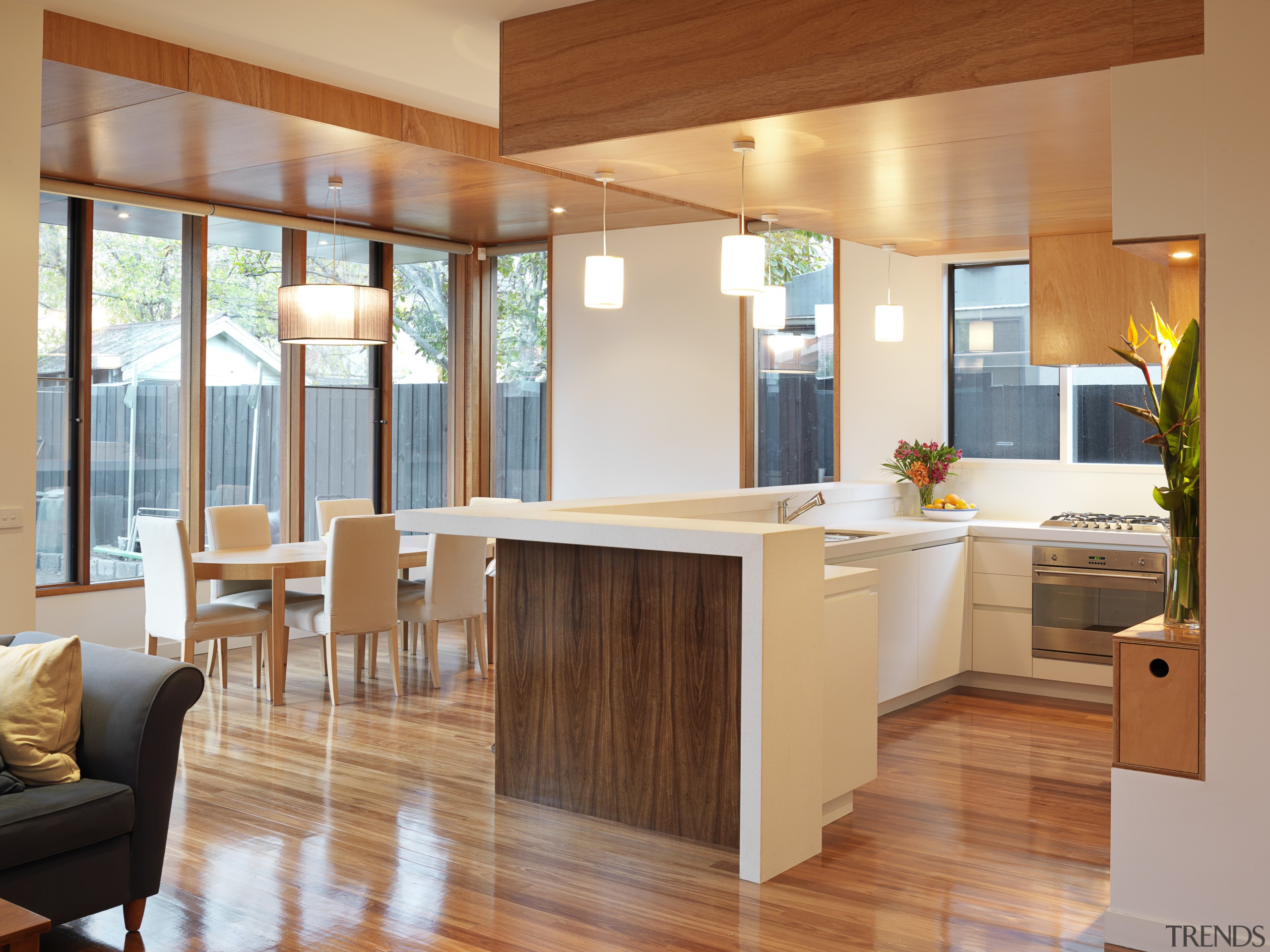 View of open-plan kitchen and dining area featuring ceiling, floor, flooring, hardwood, house, interior design, kitchen, laminate flooring, living room, real estate, room, wood, wood flooring, orange, brown