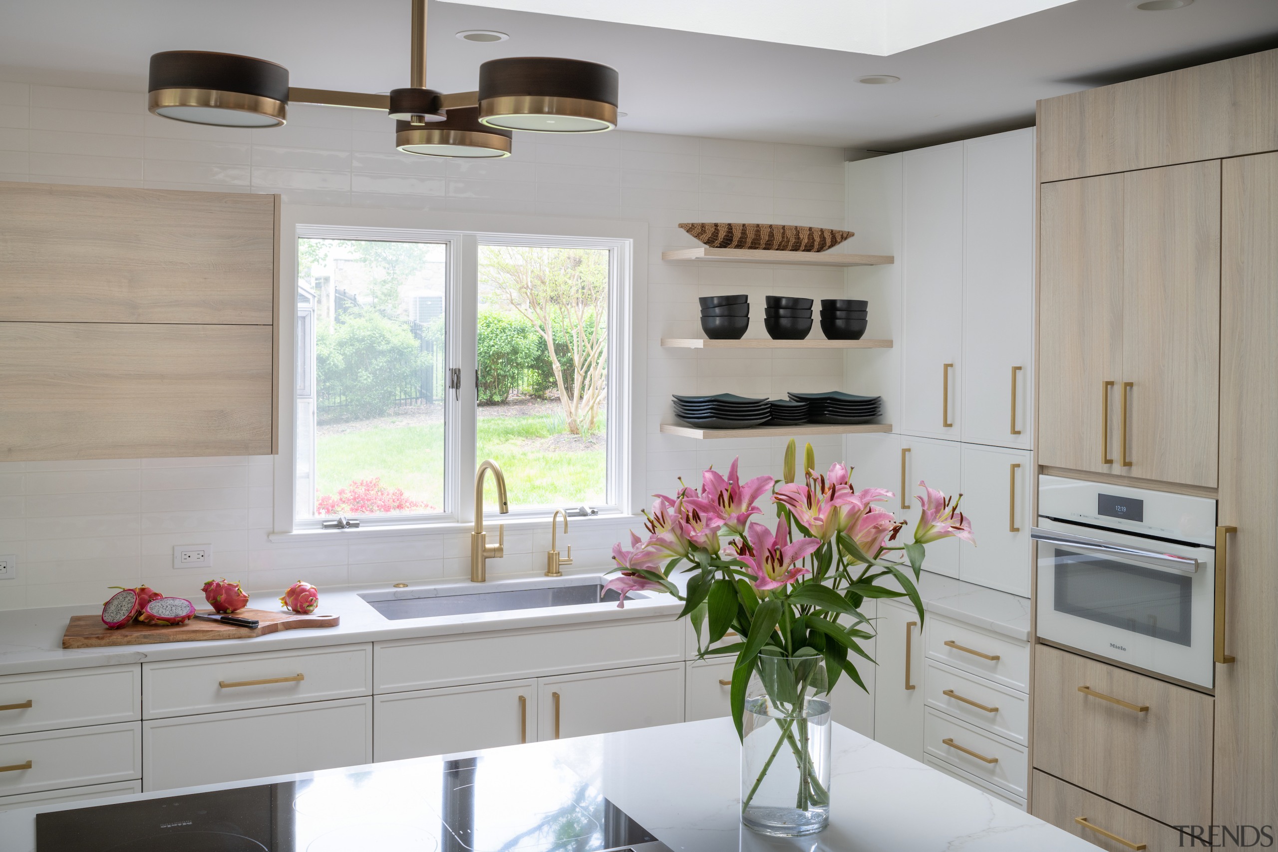 A sleek induction hob is set discreetly in 