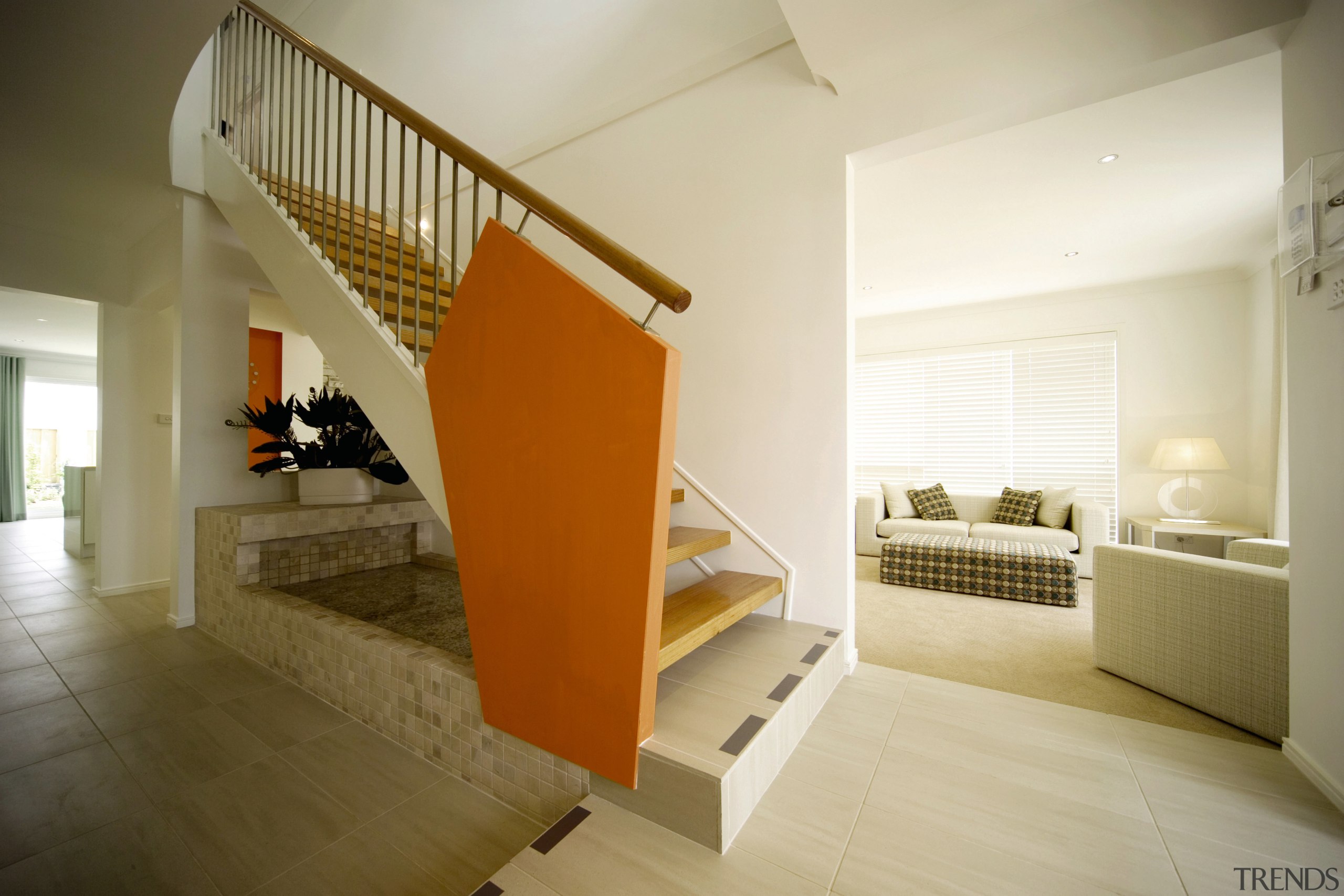 A view of a Clarendon Home. - A architecture, daylighting, estate, floor, flooring, handrail, hardwood, home, house, interior design, property, real estate, stairs, wood, wood flooring, orange, brown