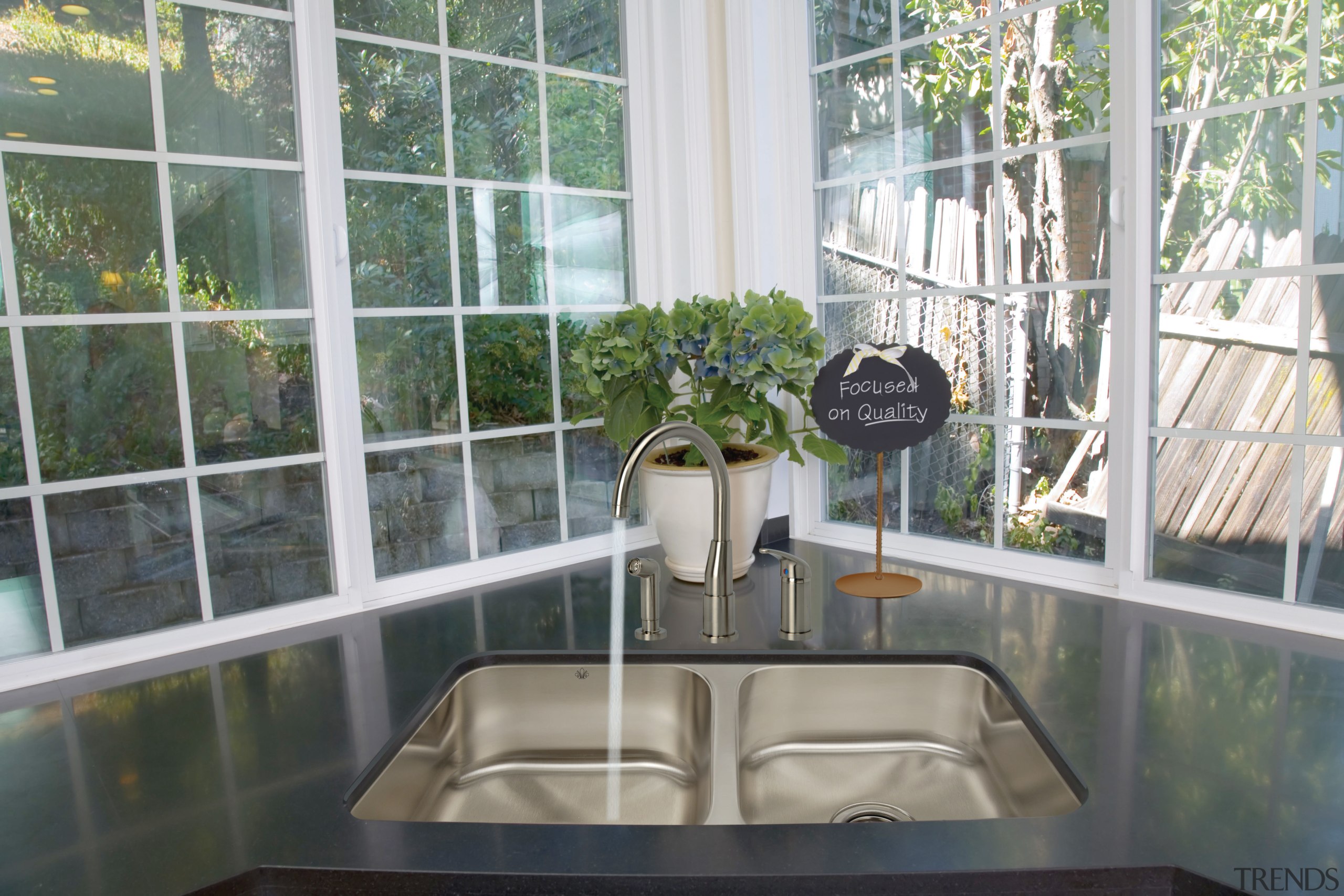 View of kitchen which features sink and arched glass, home, interior design, real estate, window, gray