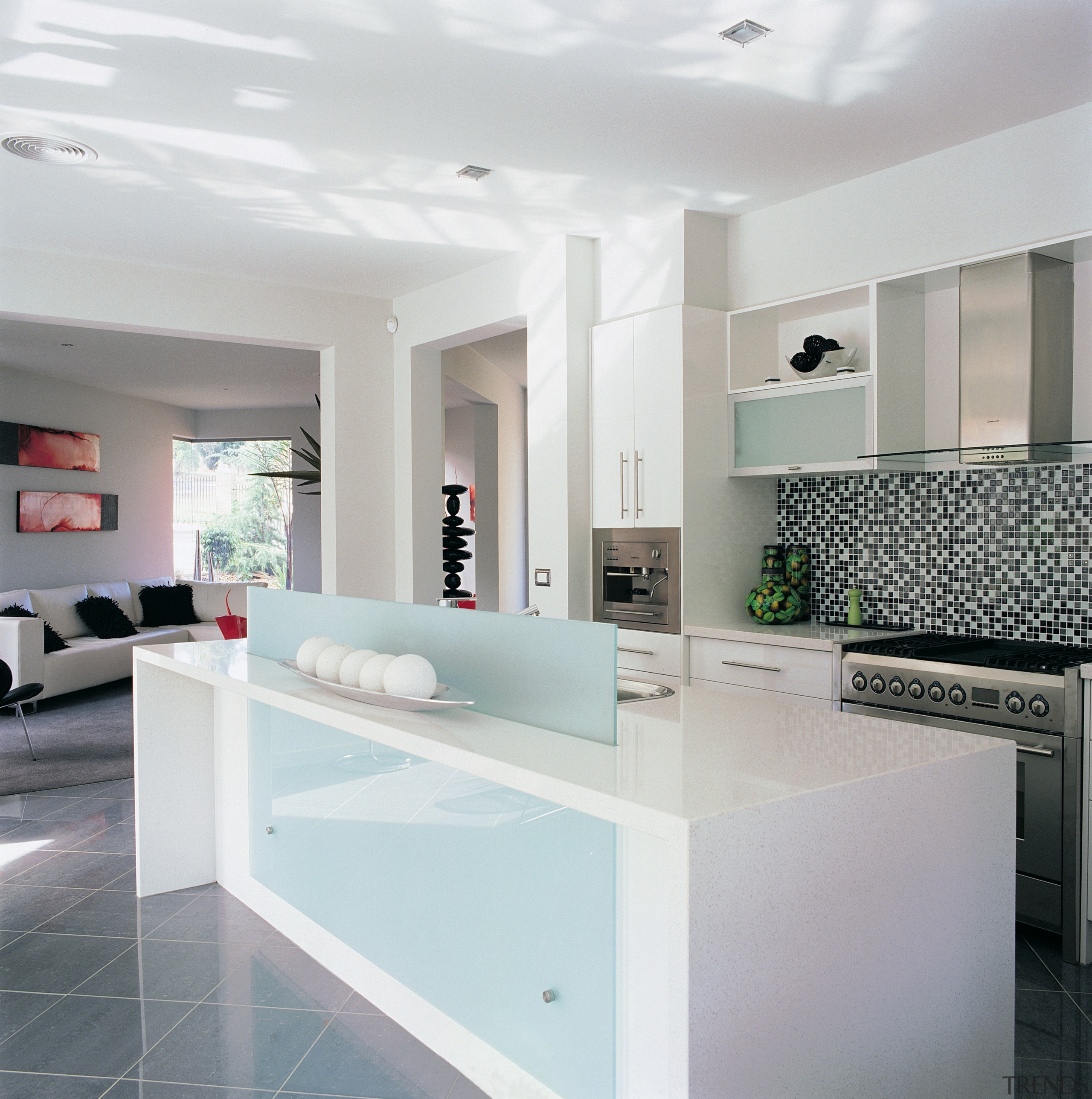 A view of a NSD Home with Kleenmaid countertop, floor, interior design, kitchen, living room, real estate, room, table, white, gray