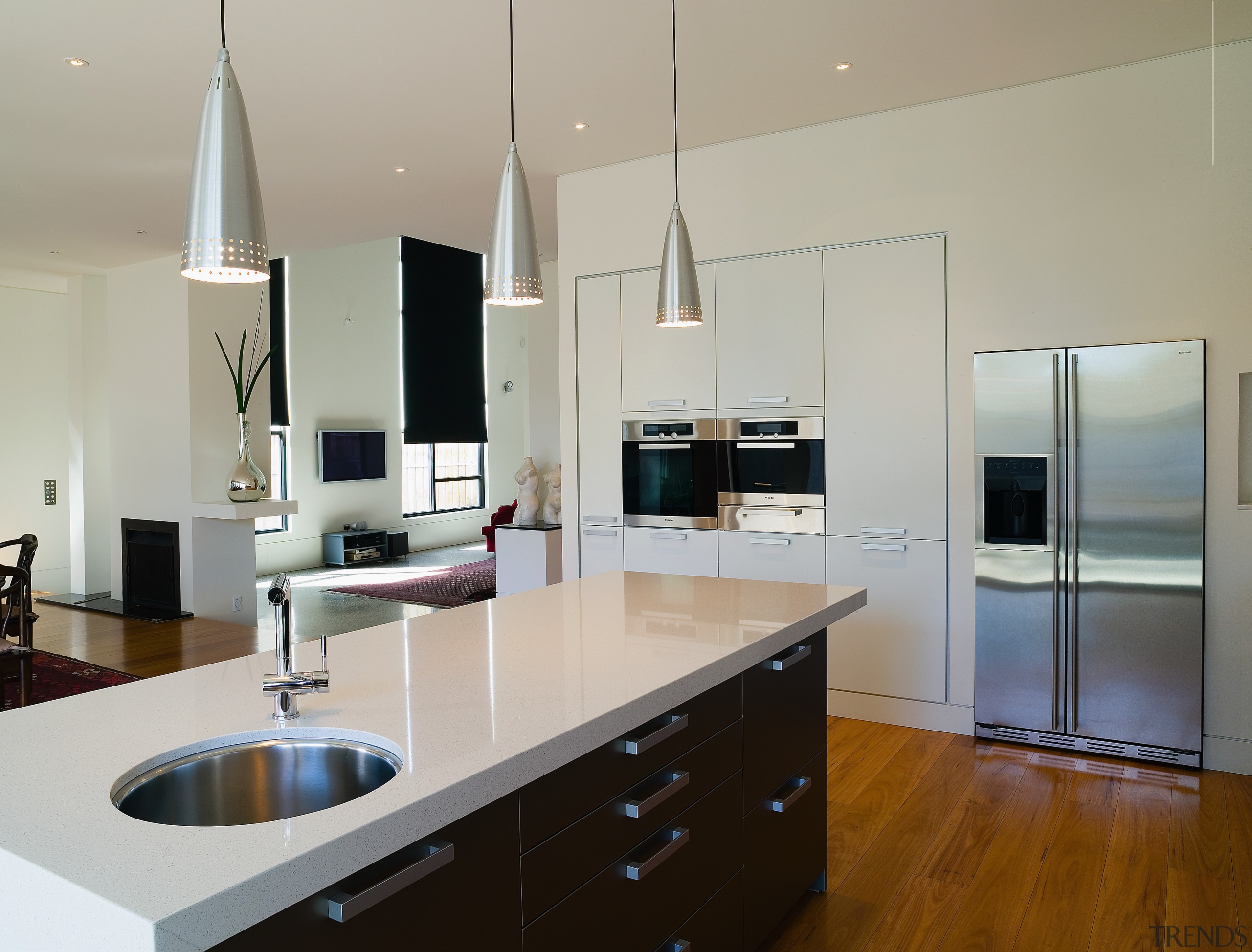 A view of the kitchen, wooden flooring and cabinetry, countertop, interior design, kitchen, real estate, room, gray