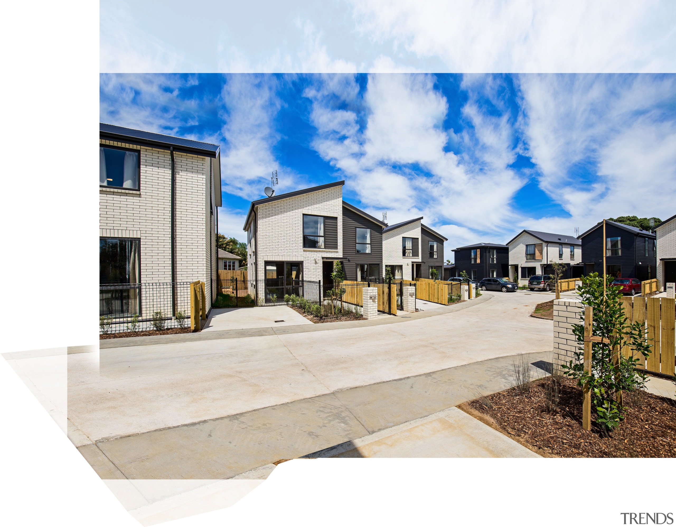 This Housing New Zealand Waterview development has achieved architecture, estate, facade, home, house, mixed use, neighbourhood, property, real estate, residential area, sky, white