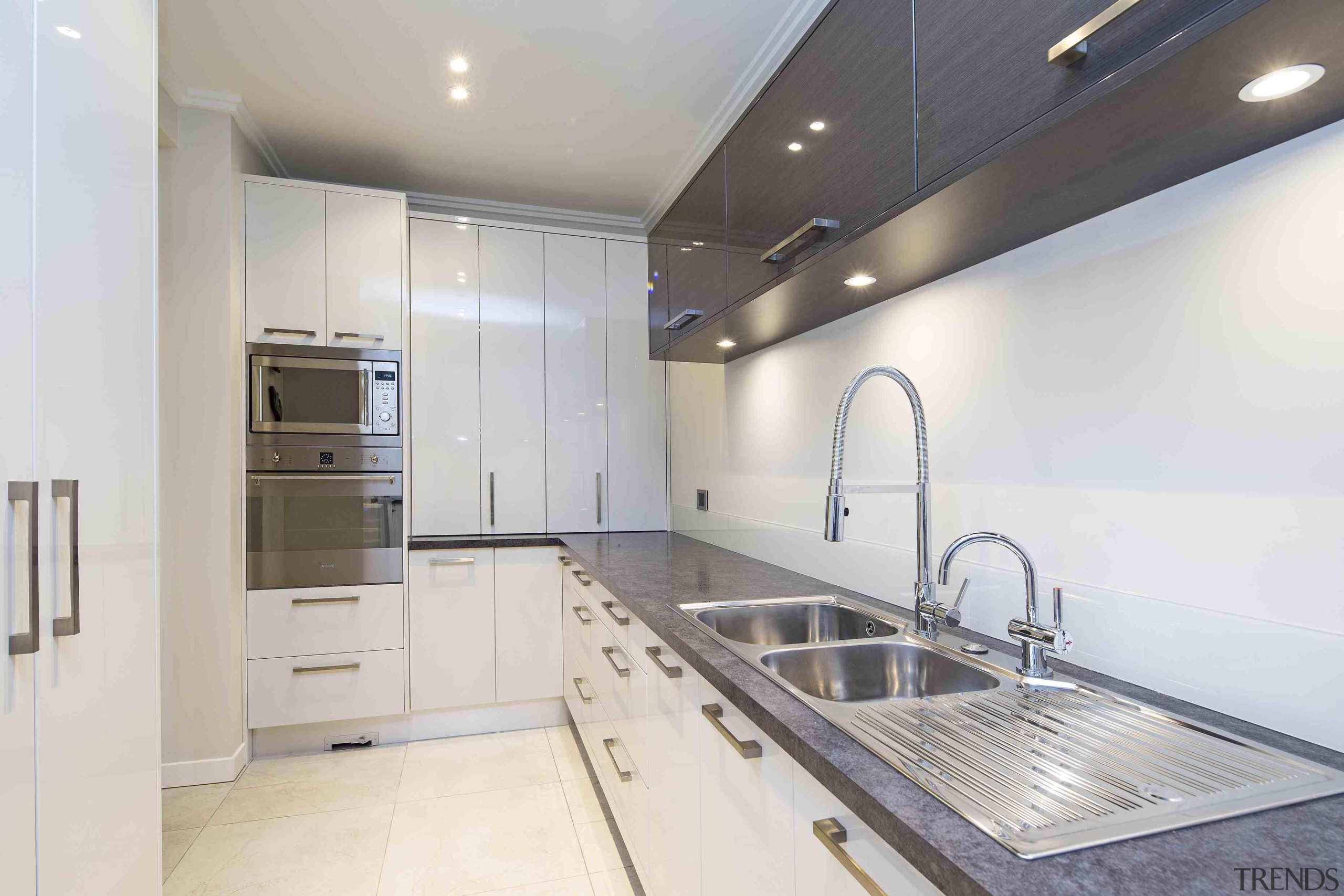 This small kitchen is actually a second, scullery countertop, interior design, kitchen, property, real estate, white