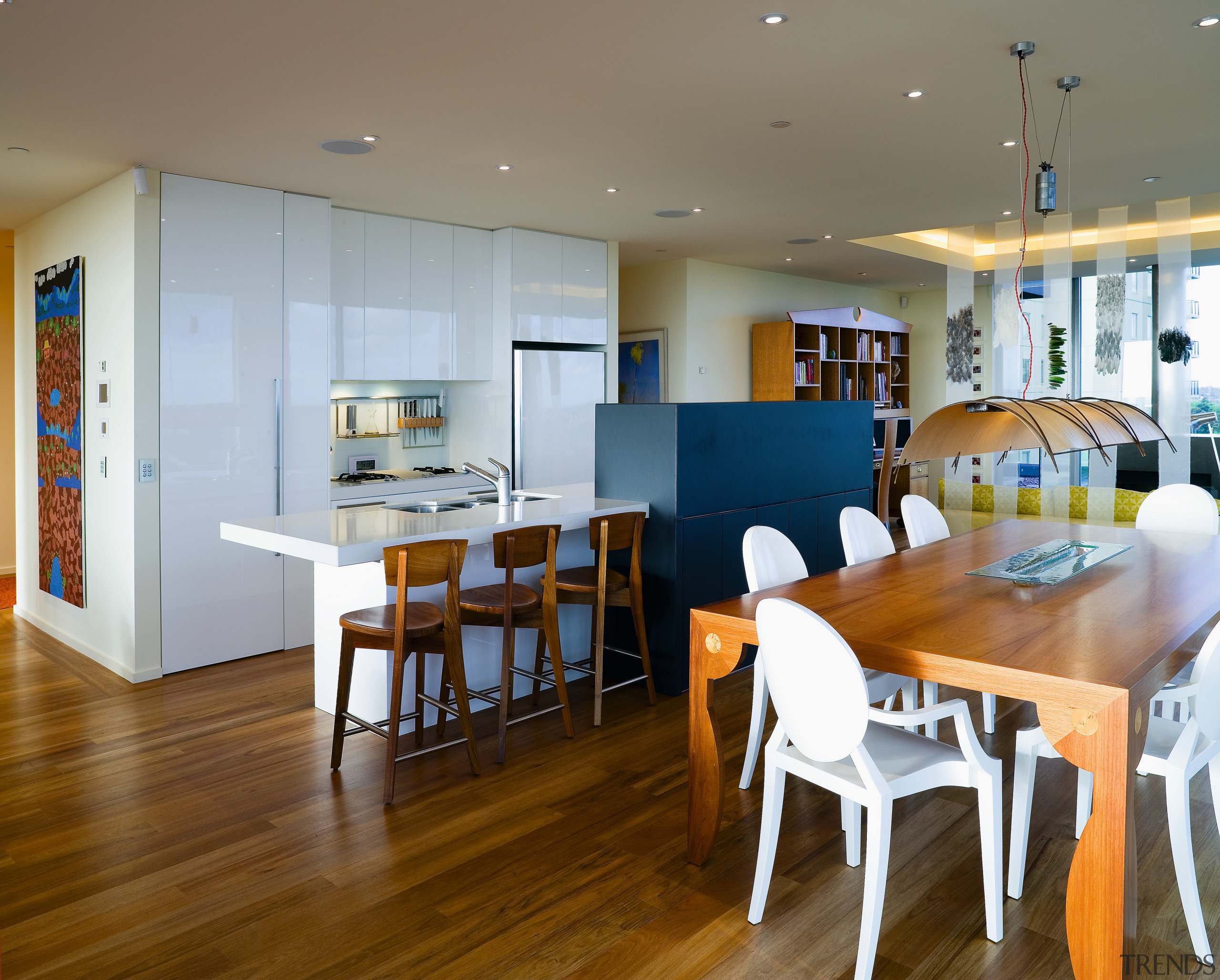 Between kitchen and dining room, the colour scheme dining room, flooring, interior design, kitchen, real estate, room, table, gray, brown