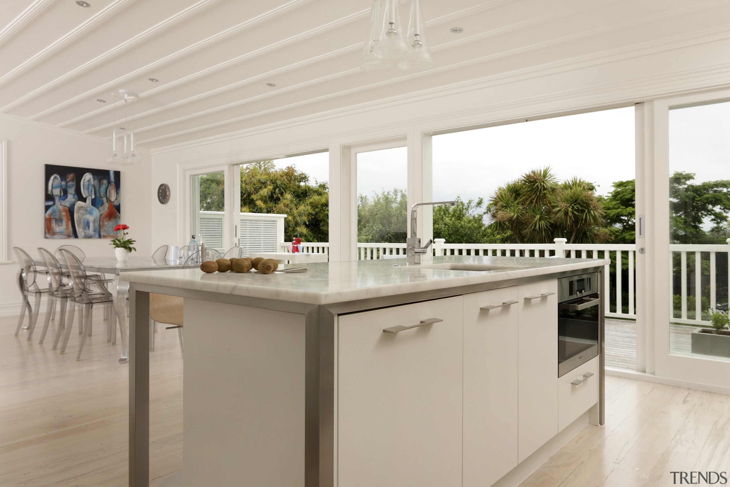 View of contemporary kitchen with light-toned flooring, ceiling countertop, cuisine classique, estate, floor, interior design, kitchen, property, real estate, window, gray