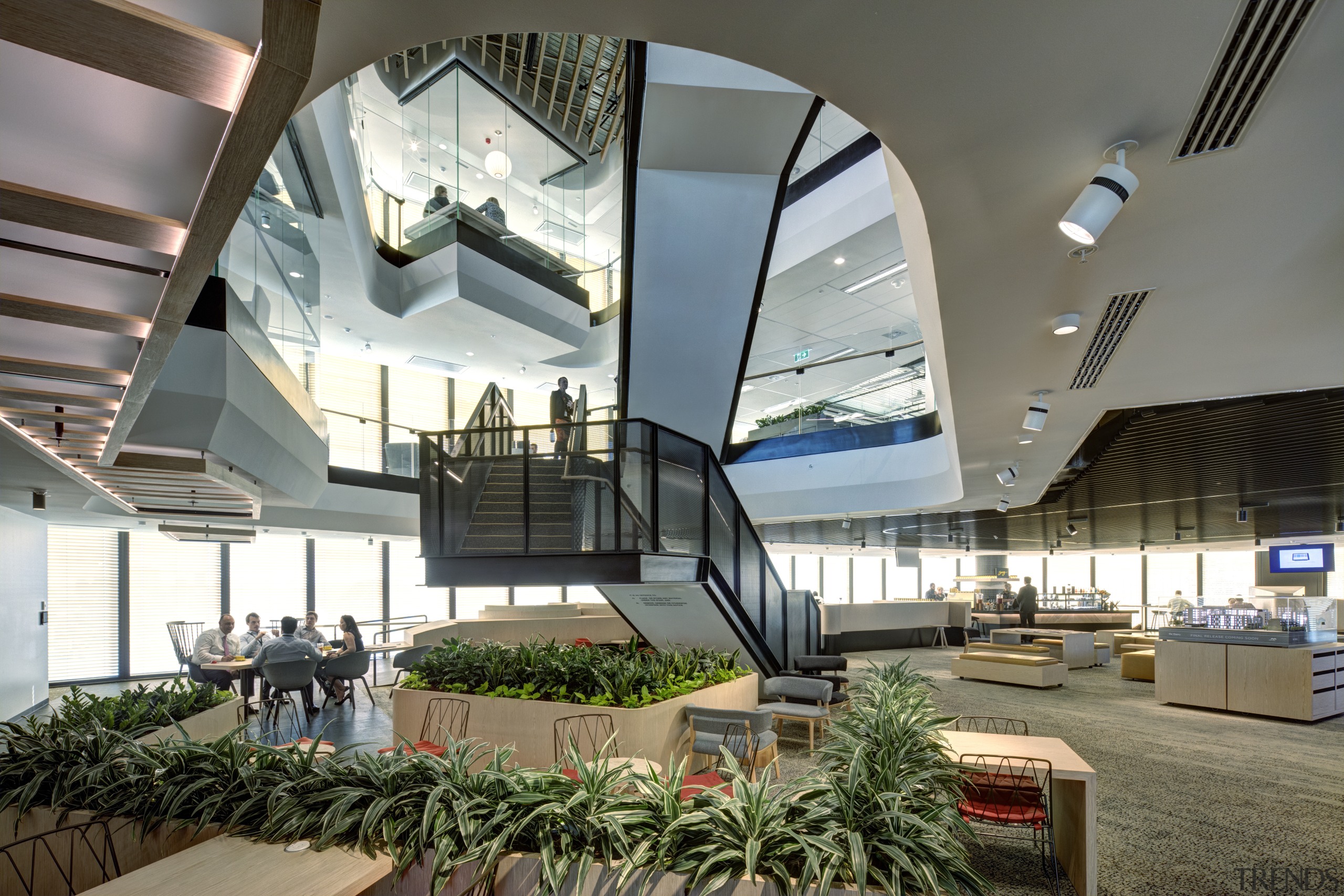 The light-filled Town Hall space on the mid architecture, building, ceiling, convention center, daylighting, design, headquarters, interior design, lobby, mixed-use, real estate, shopping mall, gray