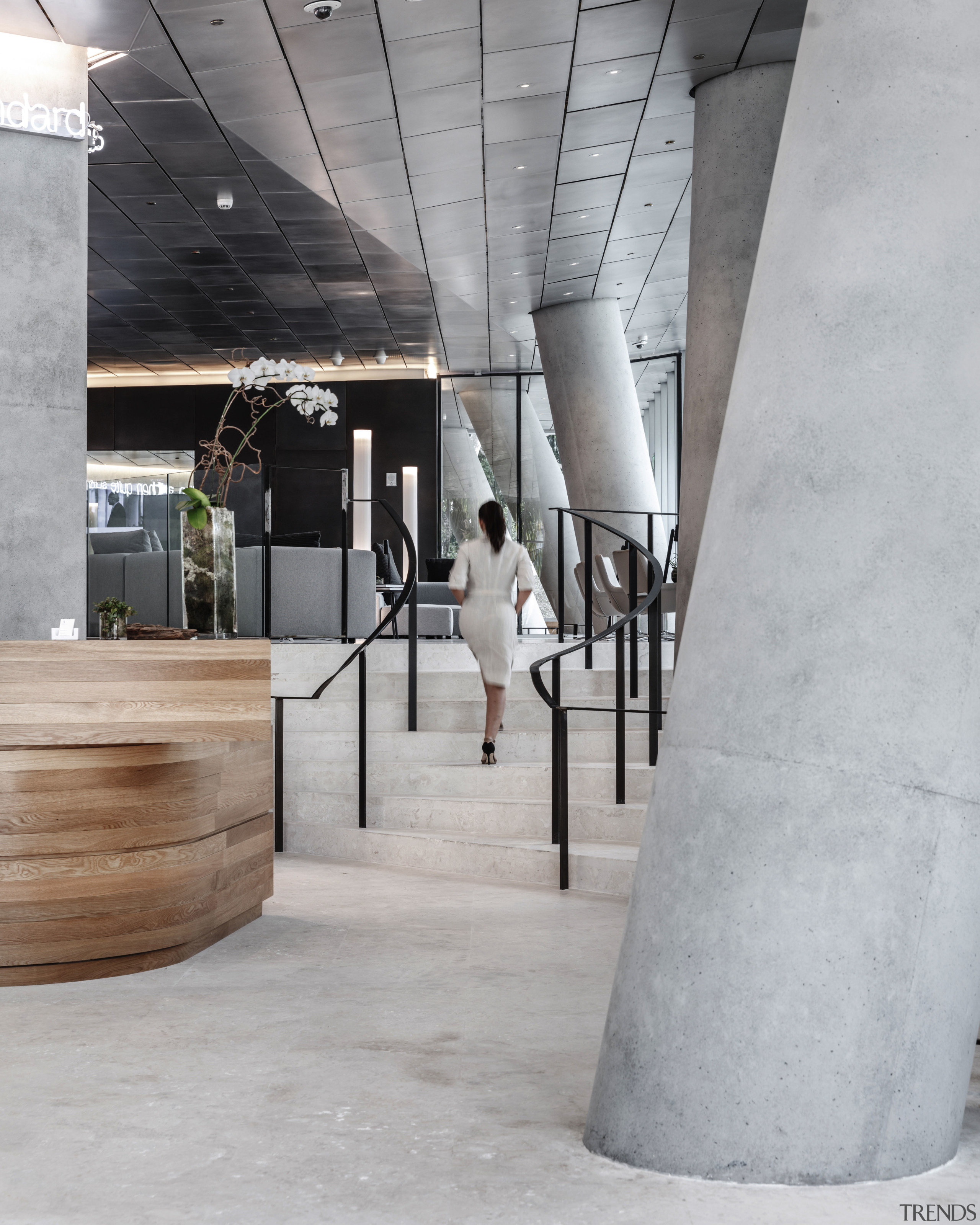 One of the ground floor lobbies of the architecture, concrete, floor, flooring, interior design, product design, table, gray