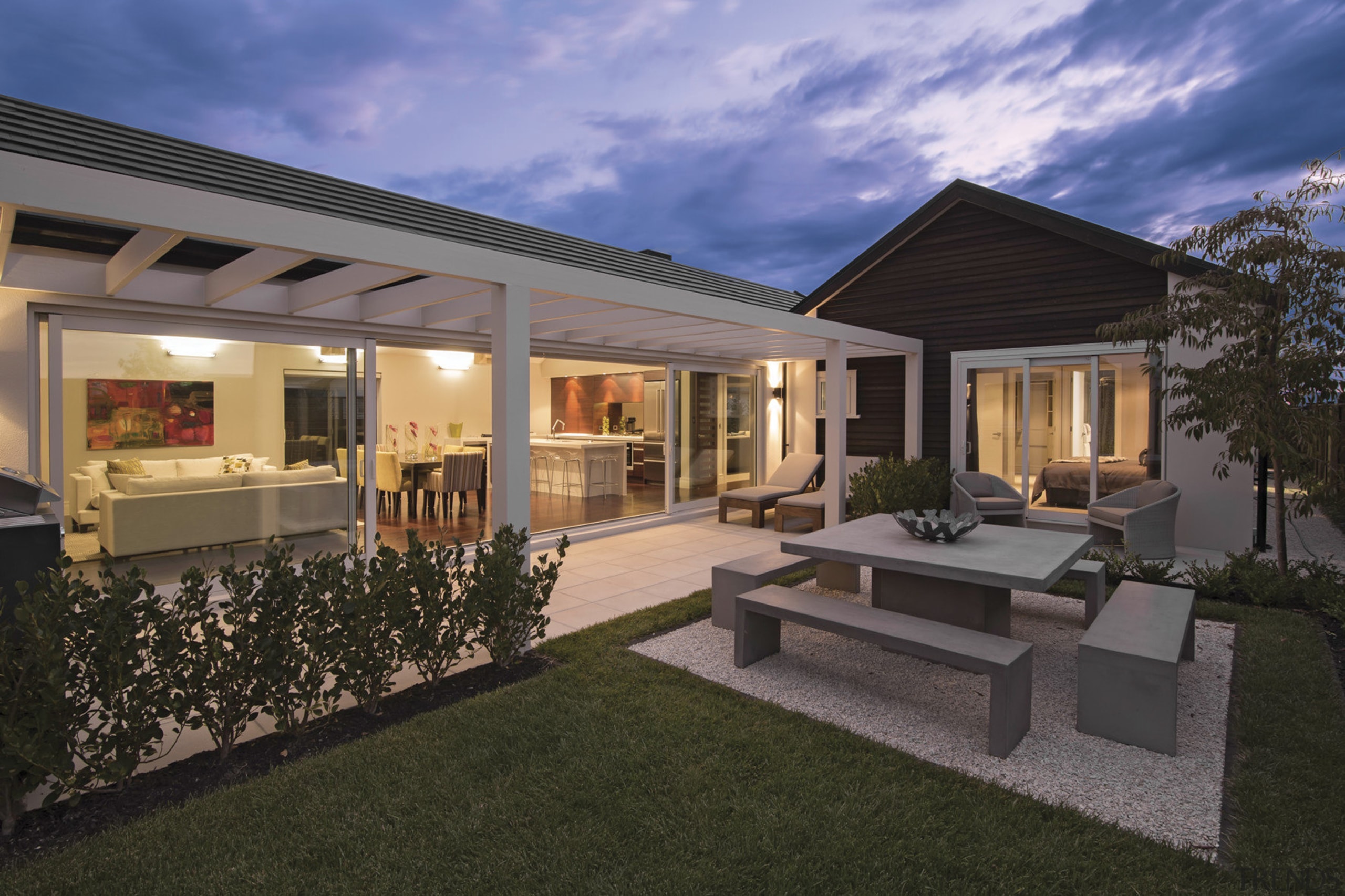 The Life at Home street of show homes backyard, cottage, elevation, estate, facade, home, house, lighting, property, real estate, residential area, siding, villa, window, black