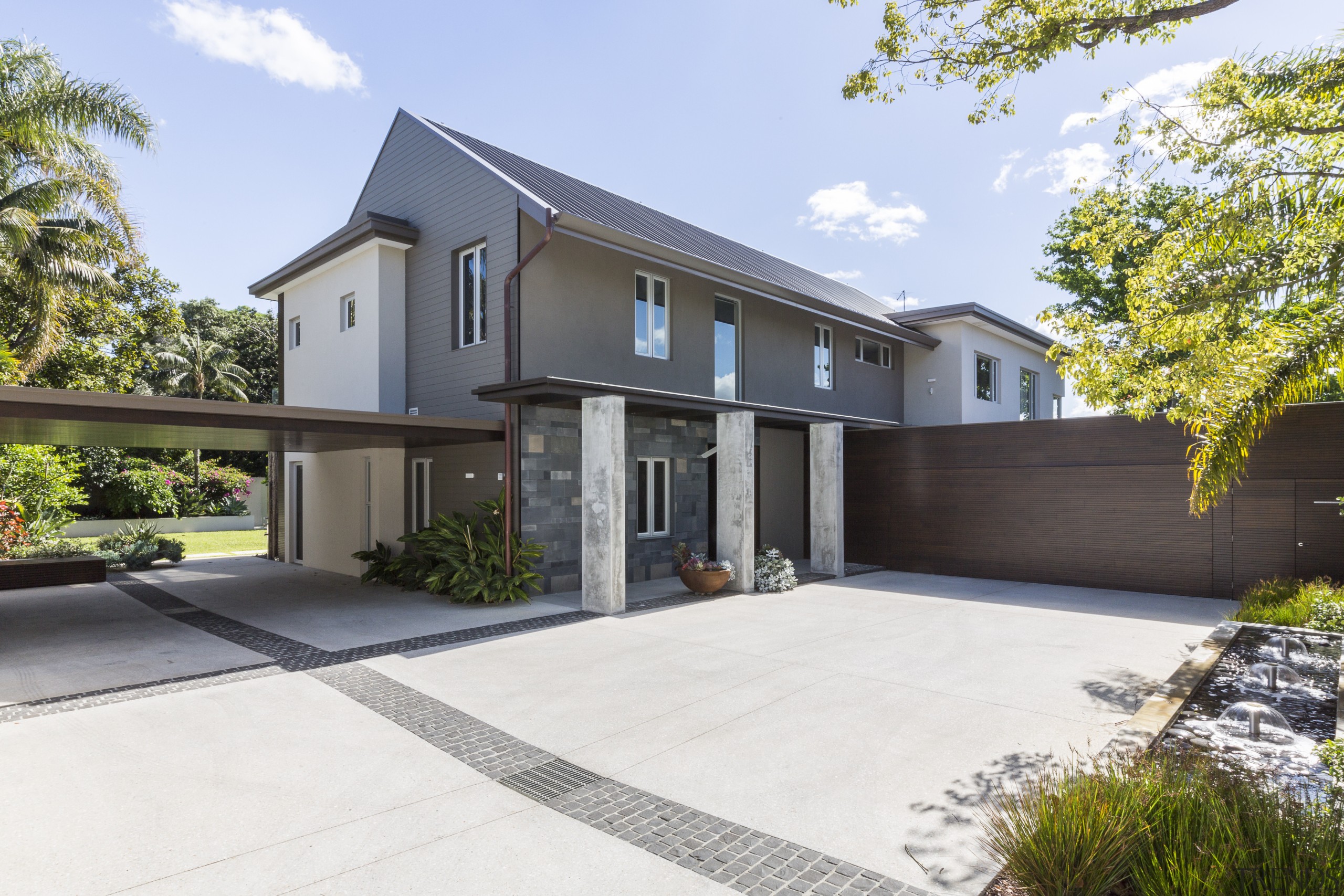 At the front of this renovated house a building, elevation, estate, facade, home, house, property, real estate, residential area, white