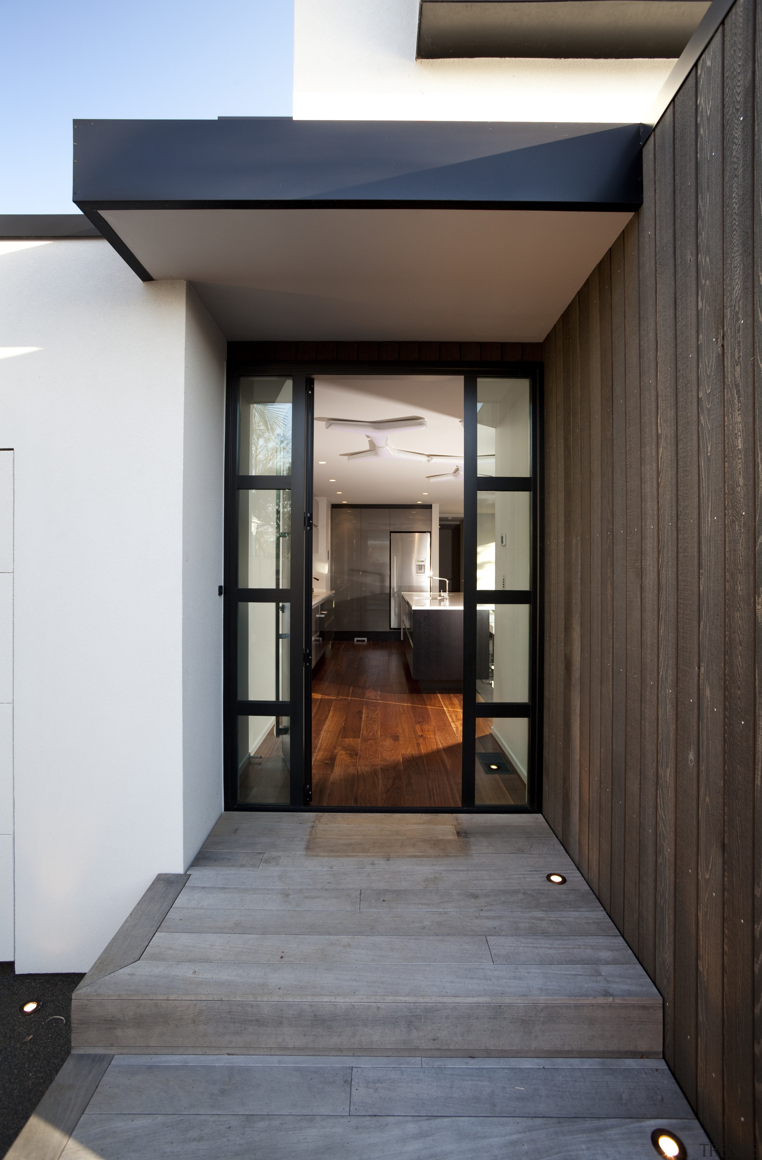 This new house was designed by Richard Furze architecture, daylighting, door, home, house, interior design, black, gray