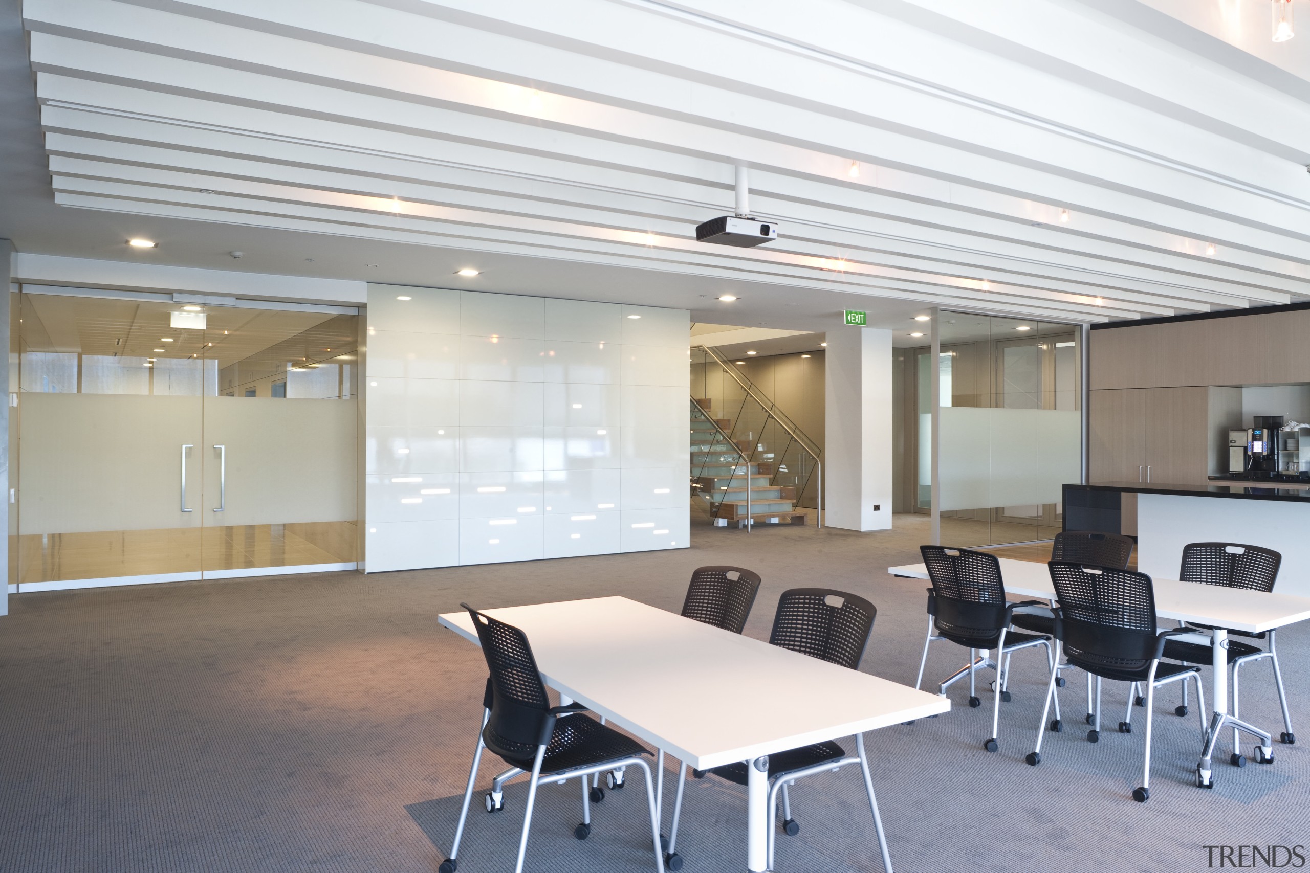 Interior view of the Deloitte offices where the architecture, ceiling, conference hall, daylighting, interior design, office, real estate, table, gray, white