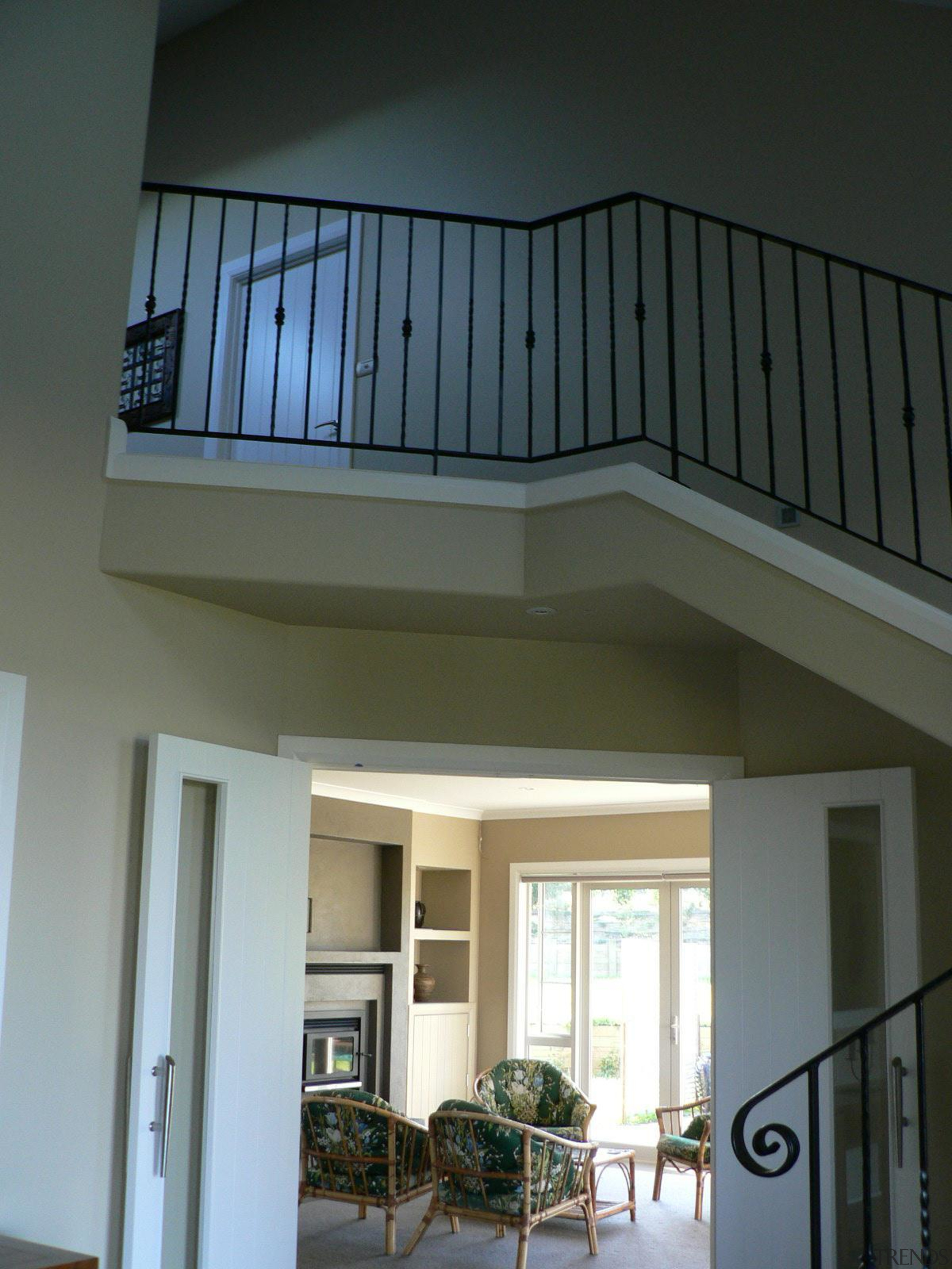 Entry with stairs and living room in Tekapo apartment, architecture, balcony, baluster, ceiling, daylighting, estate, facade, glass, handrail, home, house, property, real estate, stairs, structure, wall, window, gray, black