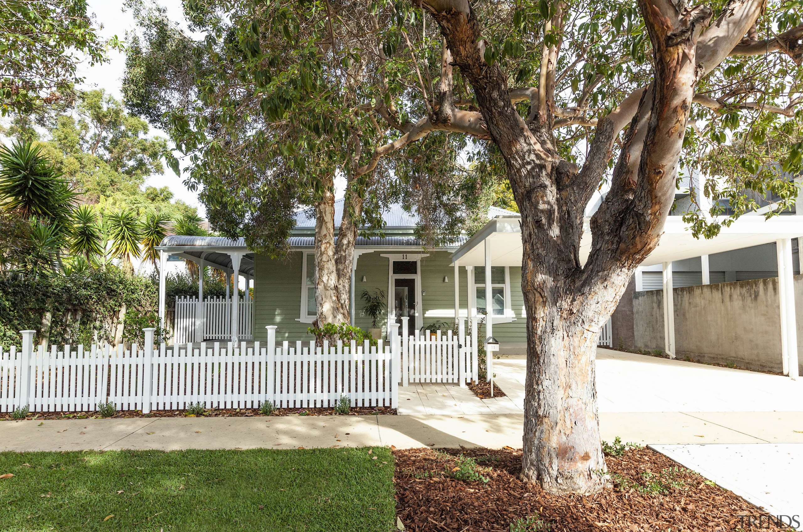 An existing high front fence was replaced with 