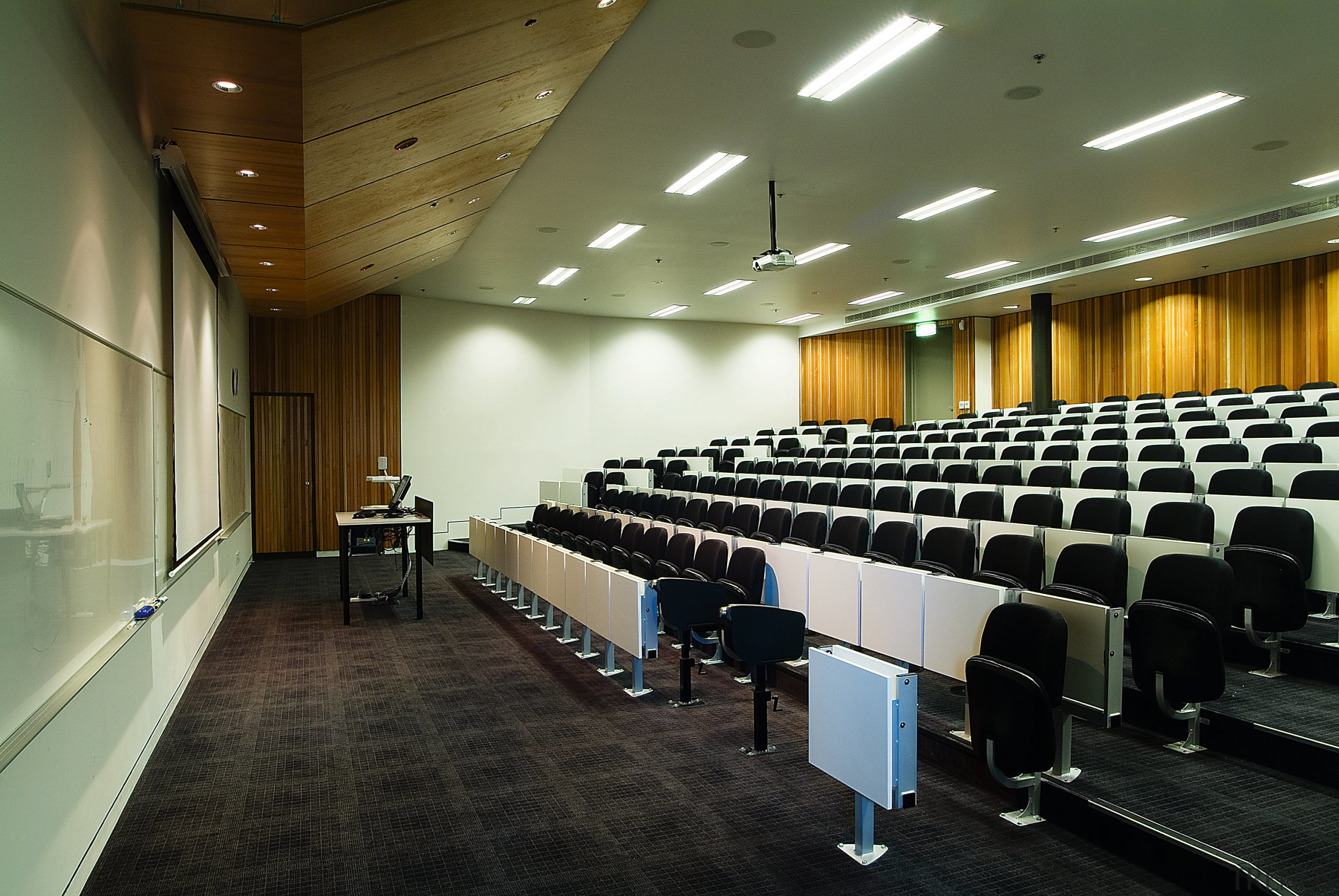 Lecture theatre at Unitec with automatic air conditioning. auditorium, ceiling, conference hall, convention center, interior design, black, brown