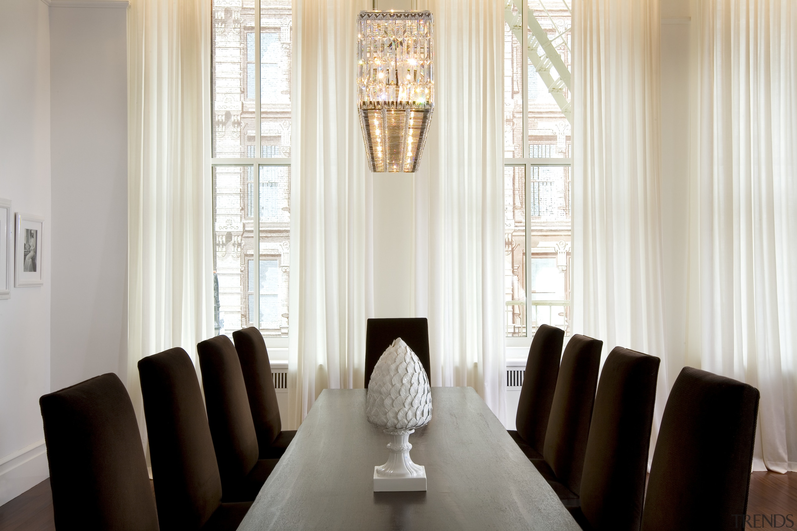 View of the dining room featuring Swarovski Crystal ceiling, curtain, decor, dining room, furniture, home, interior design, light fixture, living room, property, room, table, window, window covering, window treatment, white