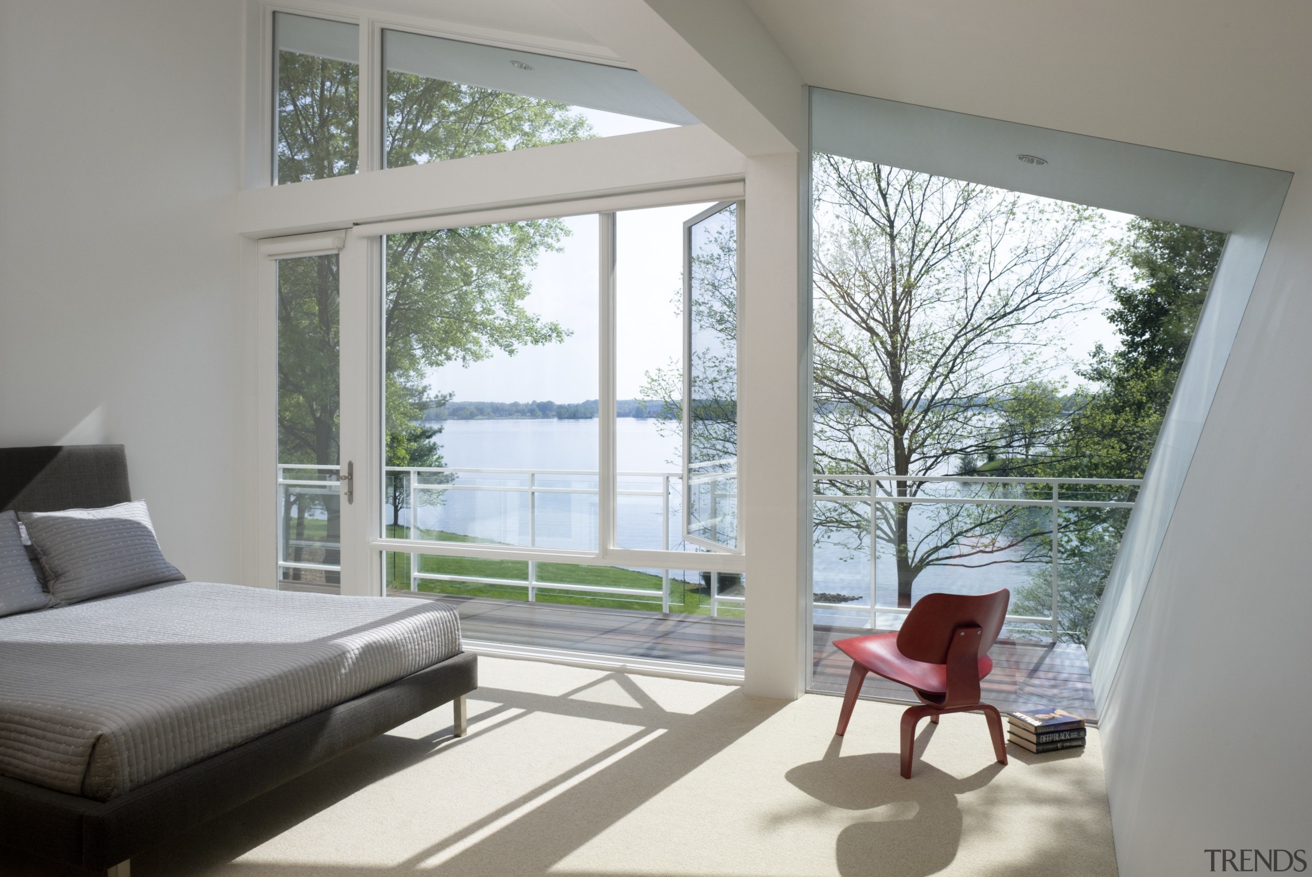 View of light-toned bedroom. - View of light-toned architecture, daylighting, door, estate, floor, home, house, interior design, living room, property, real estate, window, window covering, gray