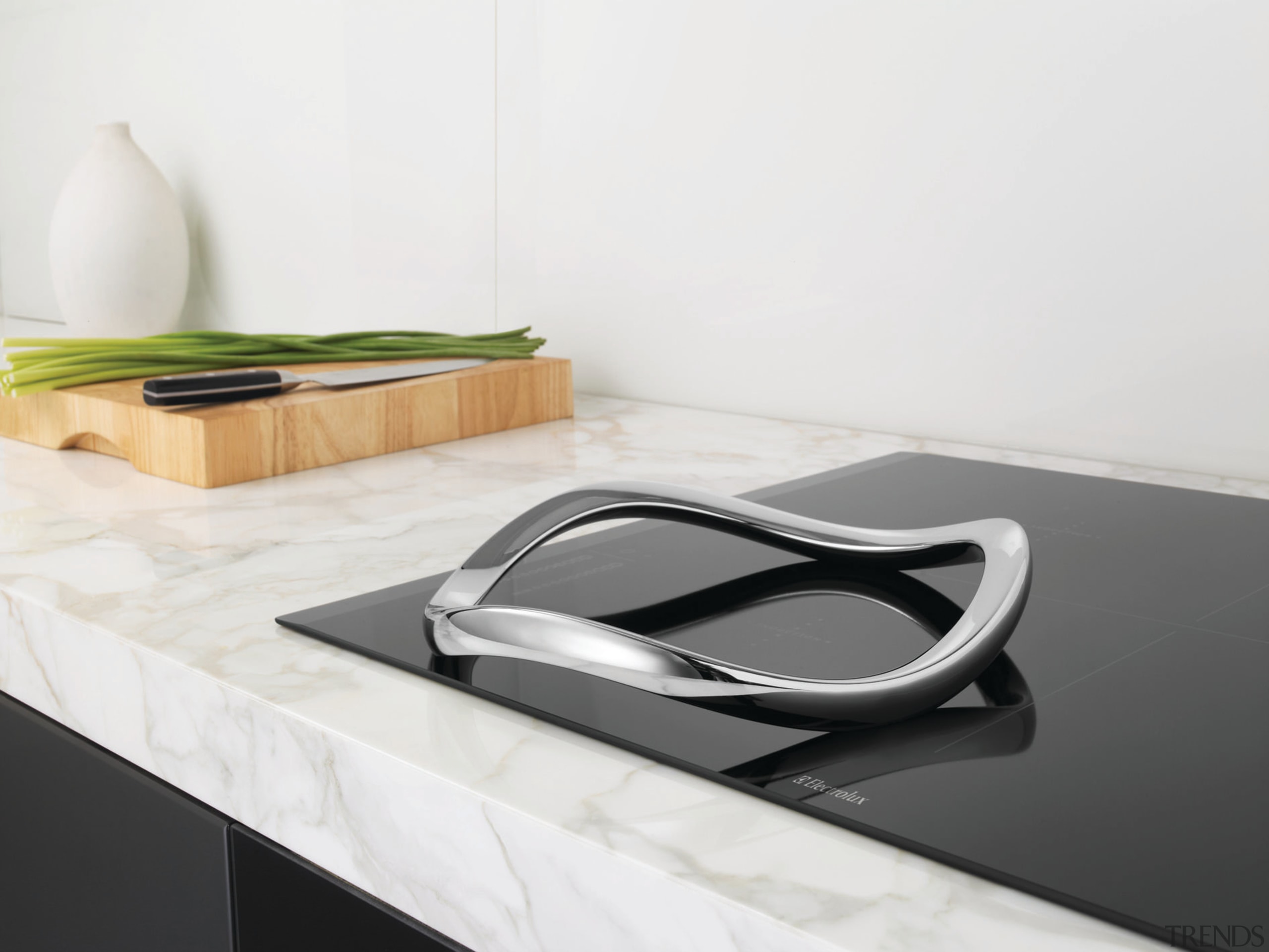 View of the E:Motion trivet from Electrolux which coffee table, floor, furniture, product, product design, sink, table, tap, white