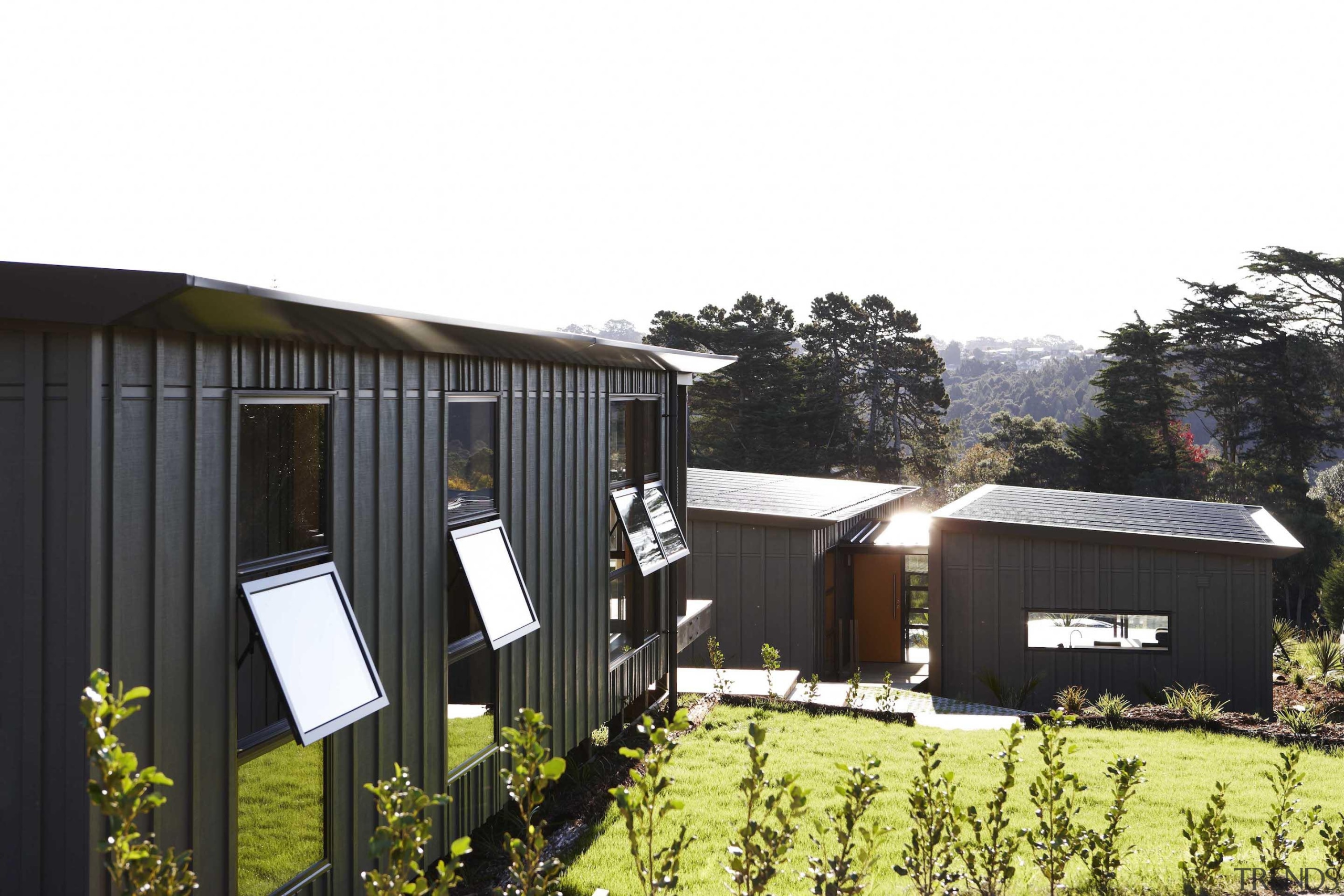 Waitakere Ranges - Studio 19 VisionWest Community Housing architecture, cottage, home, house, real estate, shed, white, black