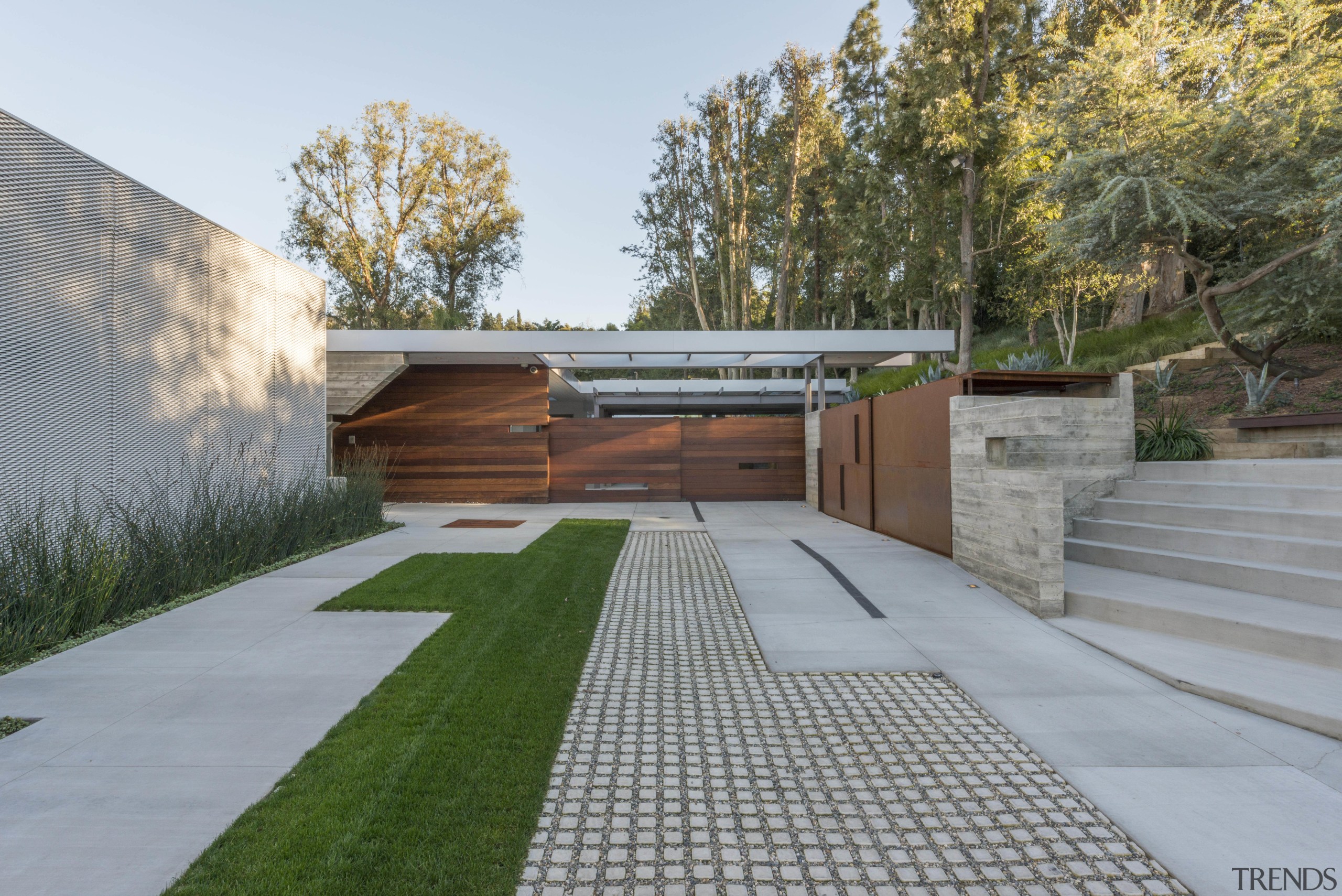 The driveway to this renovated and extended property architecture, backyard, courtyard, estate, facade, grass, house, landscape, property, real estate, residential area, walkway, yard, gray