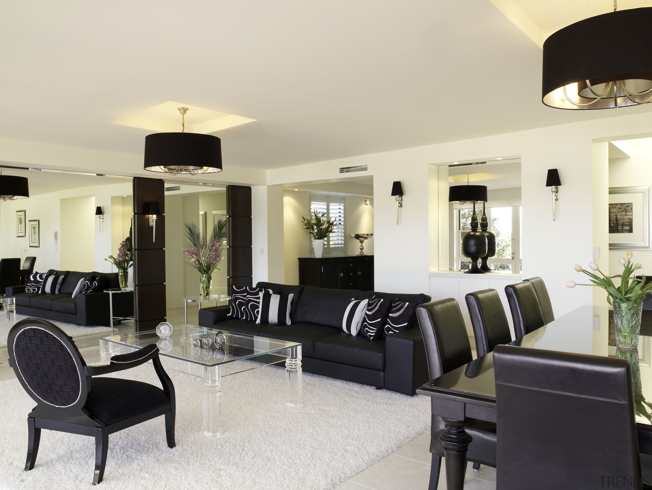 Image of a lounge area which features large ceiling, furniture, home, interior design, living room, property, room, white, black