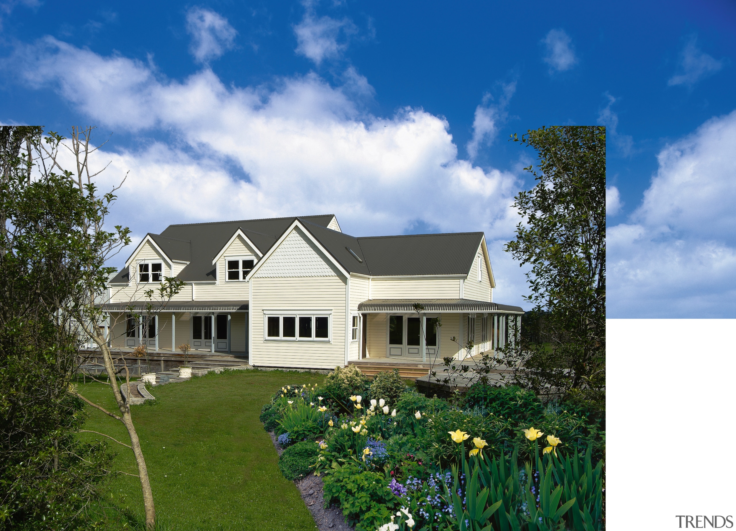 Exterior view of a home which features Palliside cottage, elevation, estate, facade, farmhouse, home, house, landscape, property, real estate, residential area, roof, siding, sky, villa, white