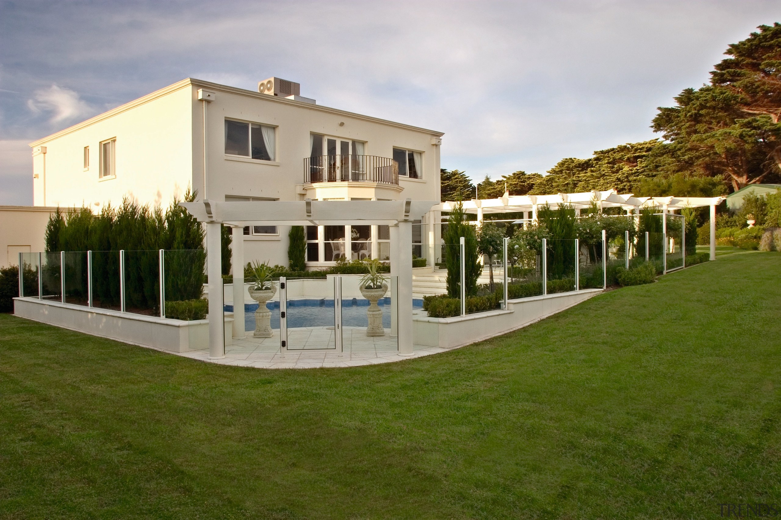 View of the backyard of this home - architecture, estate, facade, grass, home, house, mansion, property, real estate, residential area, villa, brown, gray