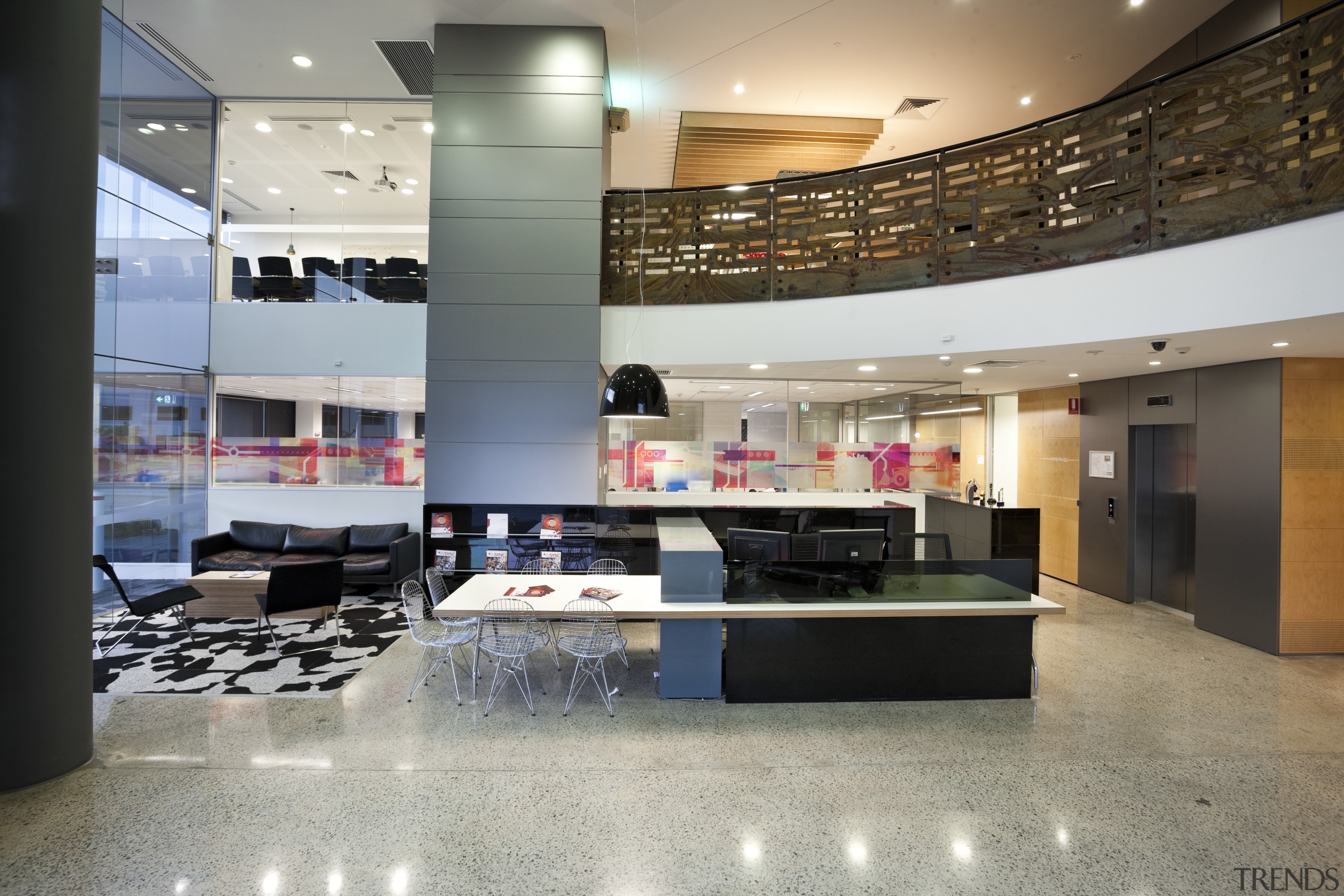 View of interior showing different levels of building. interior design, lobby, gray