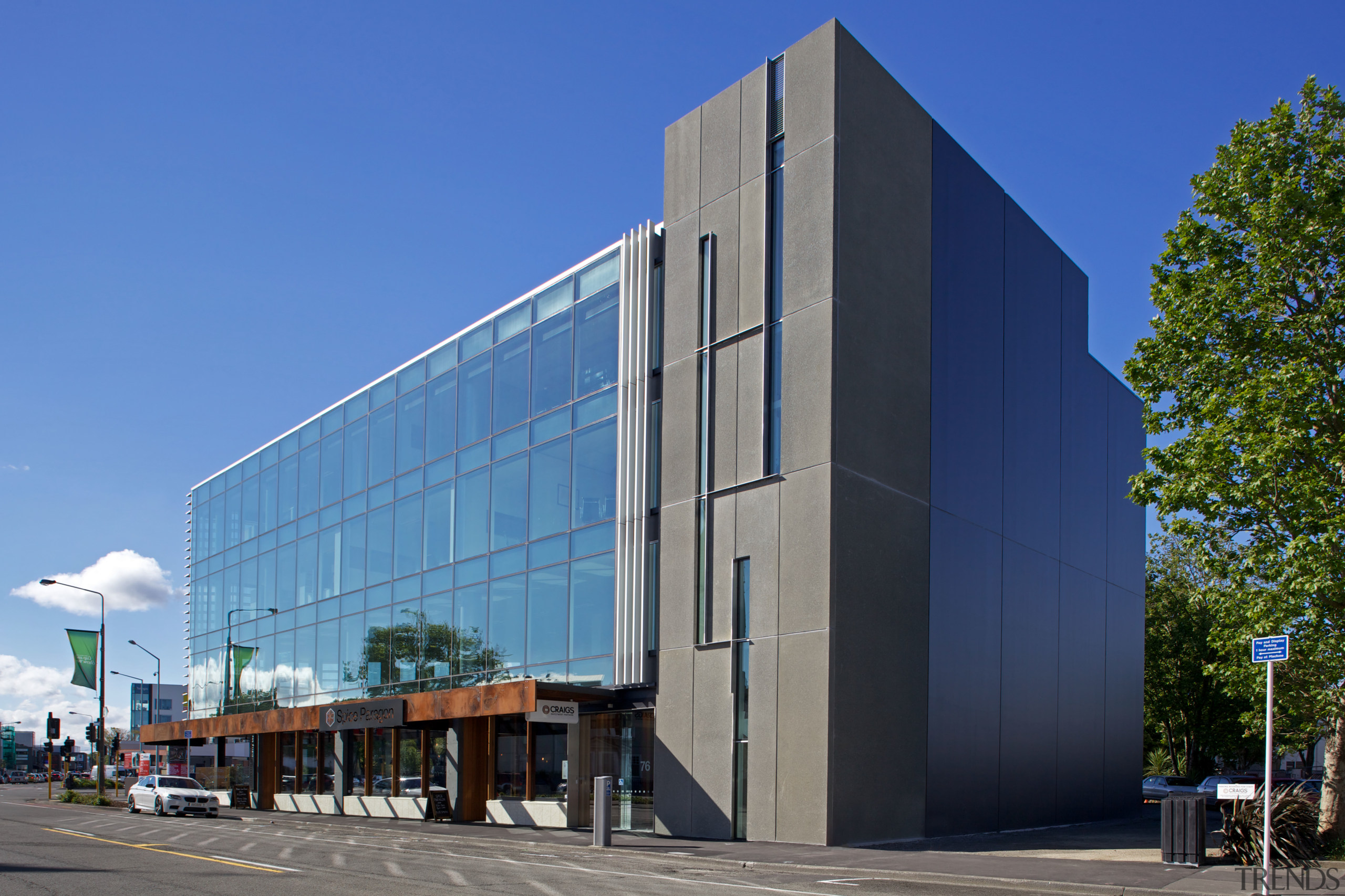 The stair tower at the rear of the architecture, building, commercial building, corporate headquarters, daytime, facade, headquarters, metropolitan area, mixed use, real estate, sky, blue