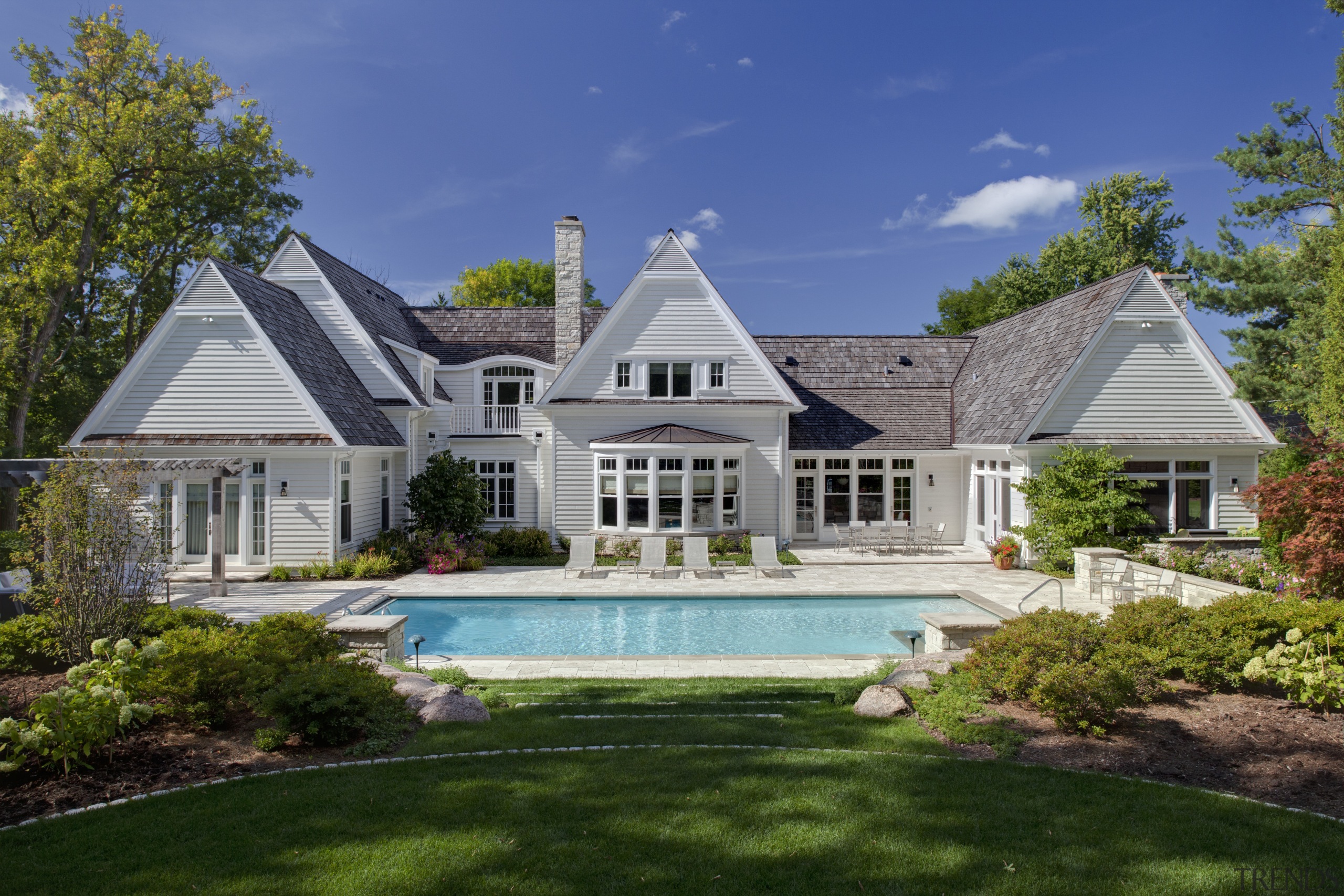 Exterior view of house with pool area. - backyard, cottage, elevation, estate, facade, farmhouse, historic house, home, house, landscape, landscaping, lawn, mansion, property, real estate, residential area, roof, siding, suburb, villa, window, yard
