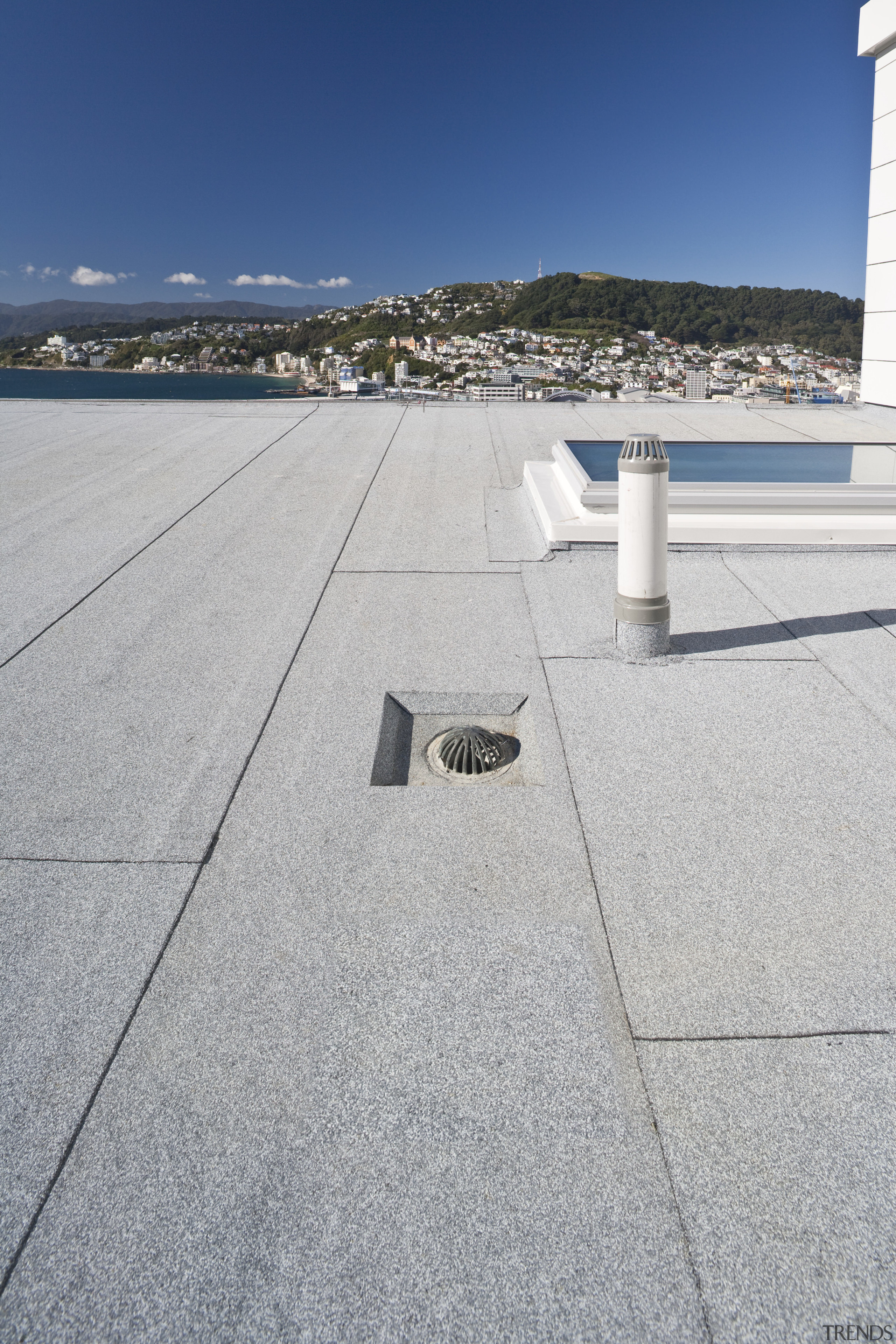 external view of drainage solutions at Chews lane asphalt, cloud, fixed link, floor, horizon, line, outdoor structure, road surface, roof, sea, sky, water, gray