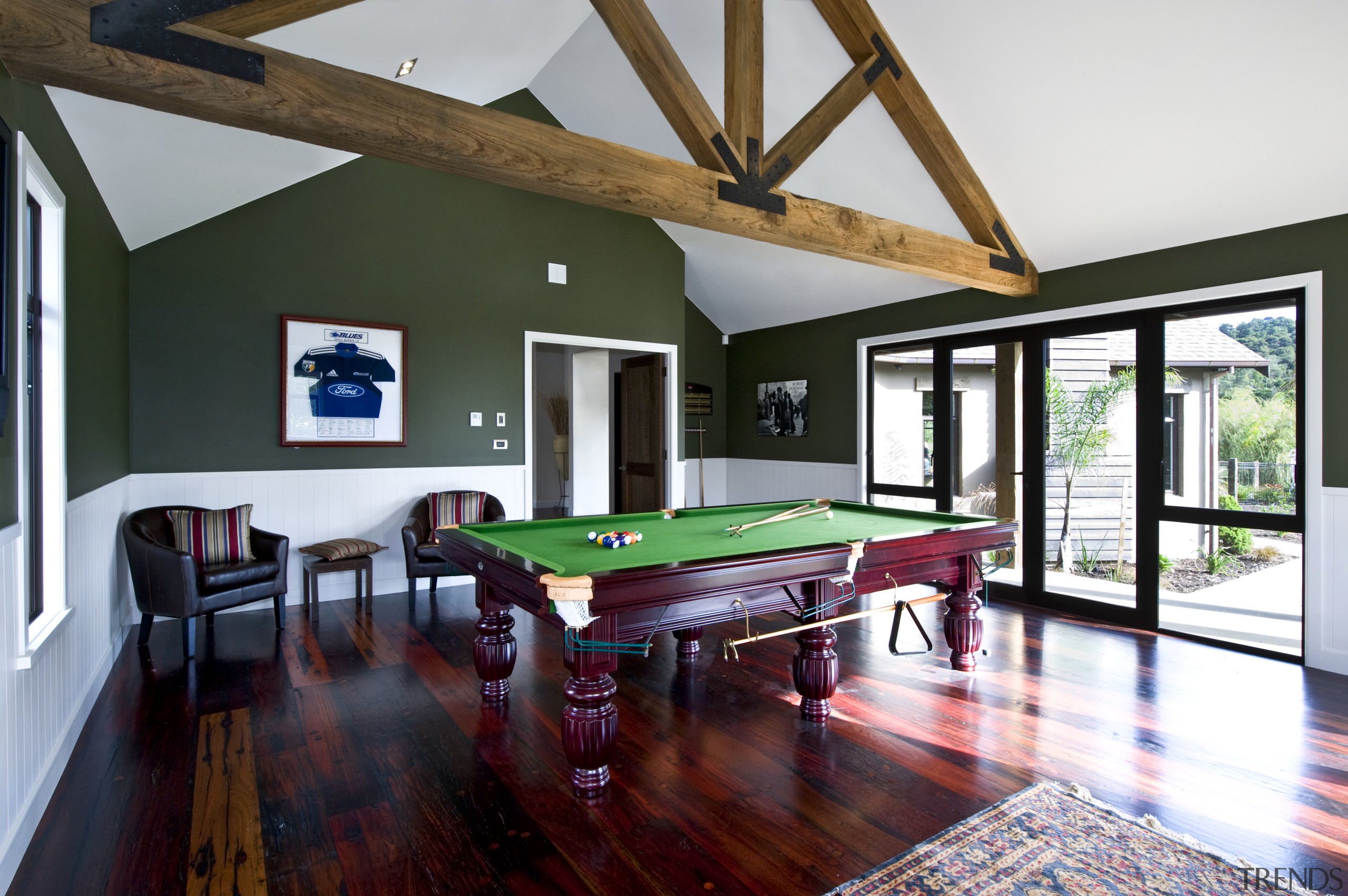 Traditional masonry home uses macrocarpa beams and floors billiard room, billiard table, ceiling, estate, hardwood, home, house, interior design, living room, pool, real estate, recreation room, room, table, window, wood, white