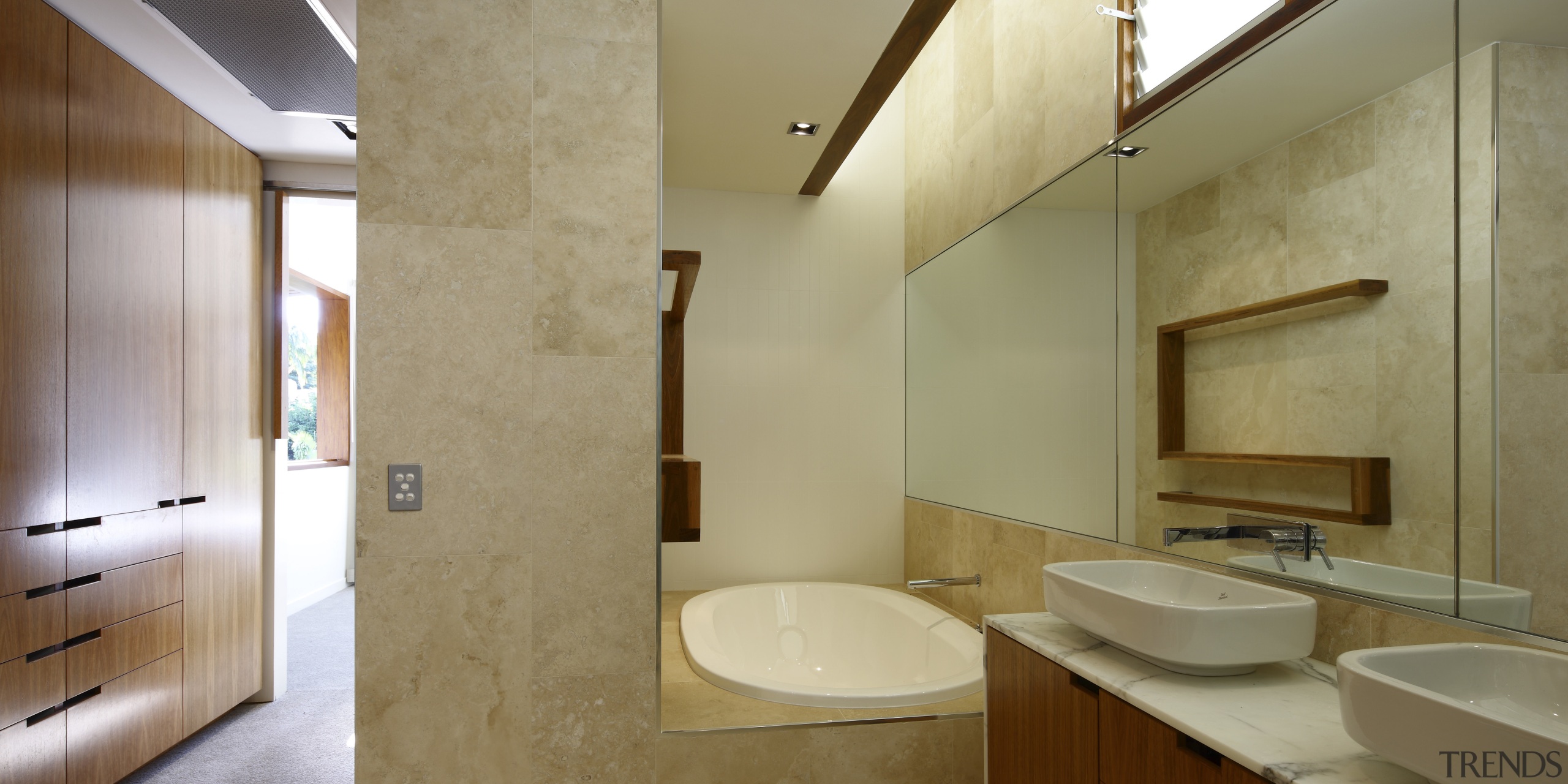 A picture of travertine tile, mirror and warm architecture, bathroom, daylighting, home, interior design, real estate, room, brown