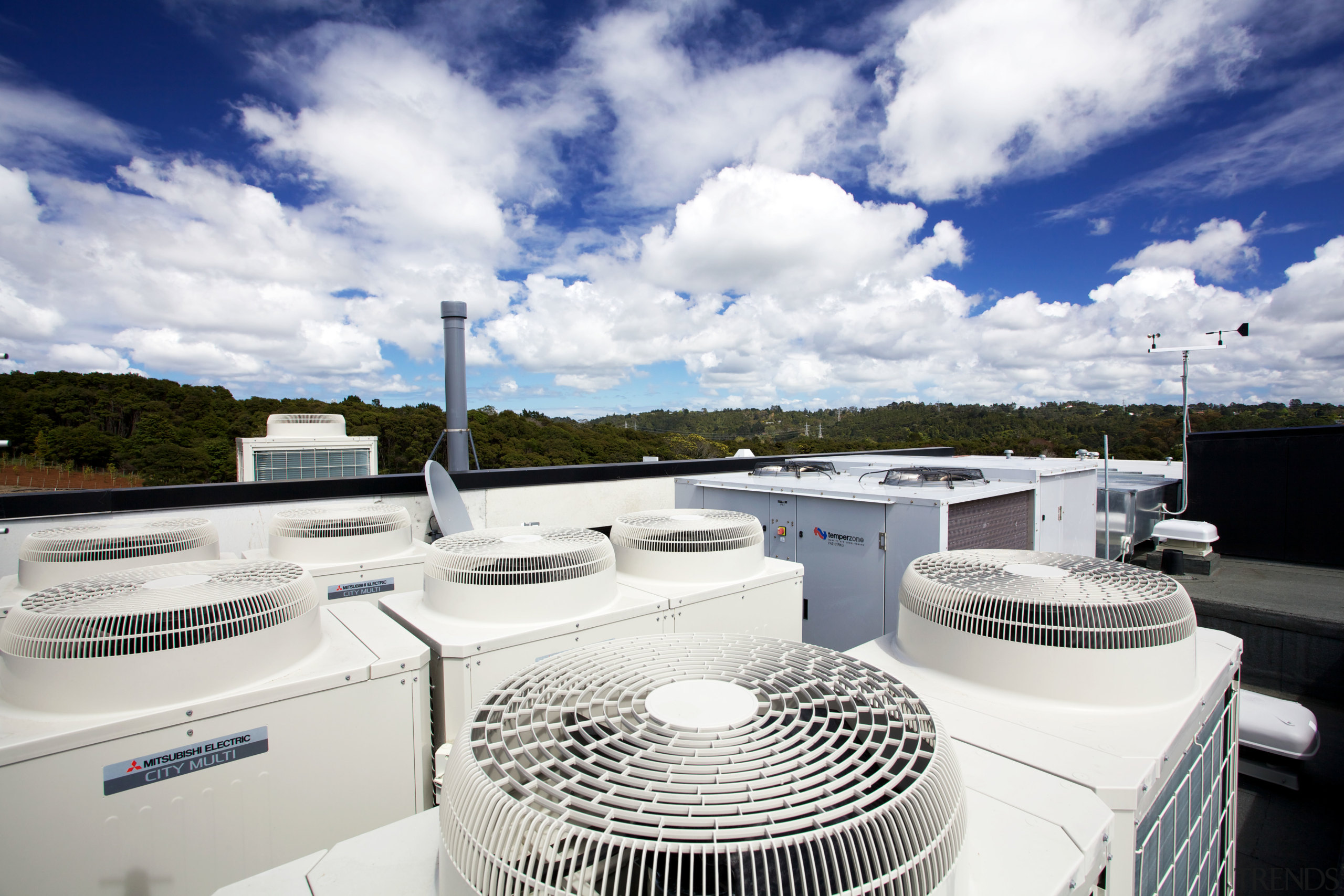 The clean-lined architecure of the facility is matched water, yacht, white