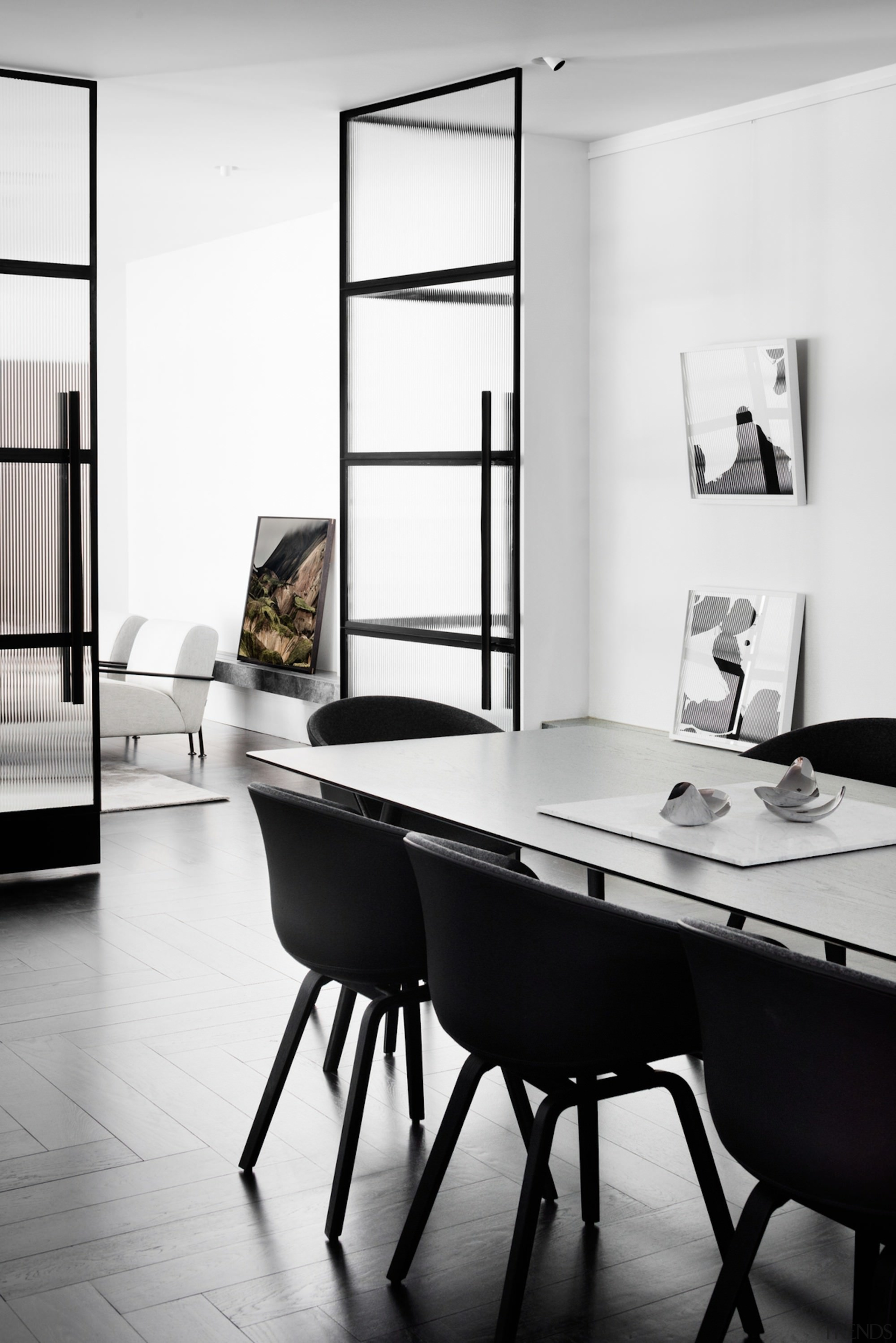 The dining area with angled mirrors - The black and white, chair, furniture, interior design, product design, shelf, shelving, table, white