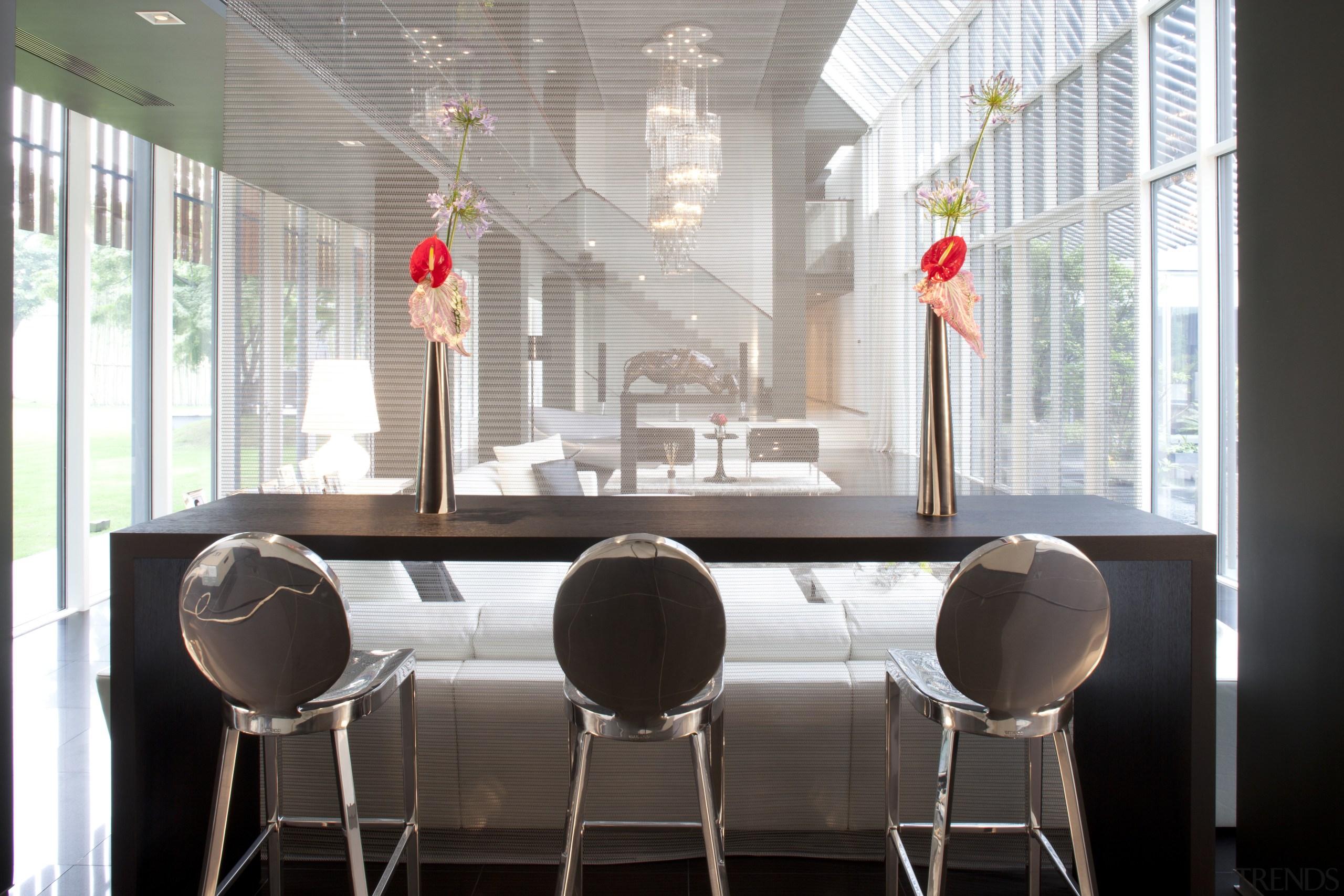 View of breakfast bar with black table, bar architecture, chair, dining room, furniture, interior design, table, window, white, black