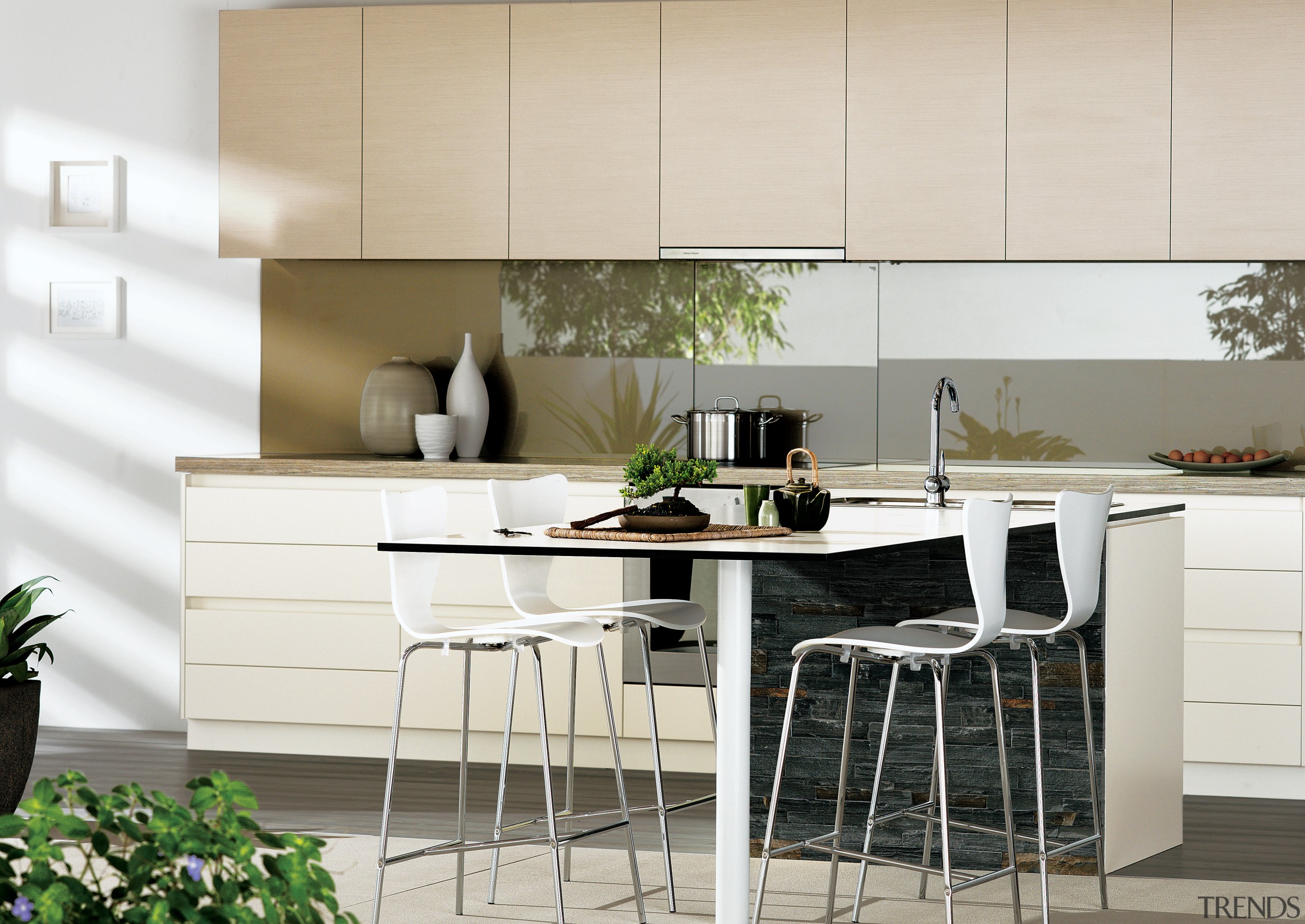 A view of a kitchen with laminated benchtops. countertop, cuisine classique, dining room, furniture, interior design, kitchen, product design, table, white