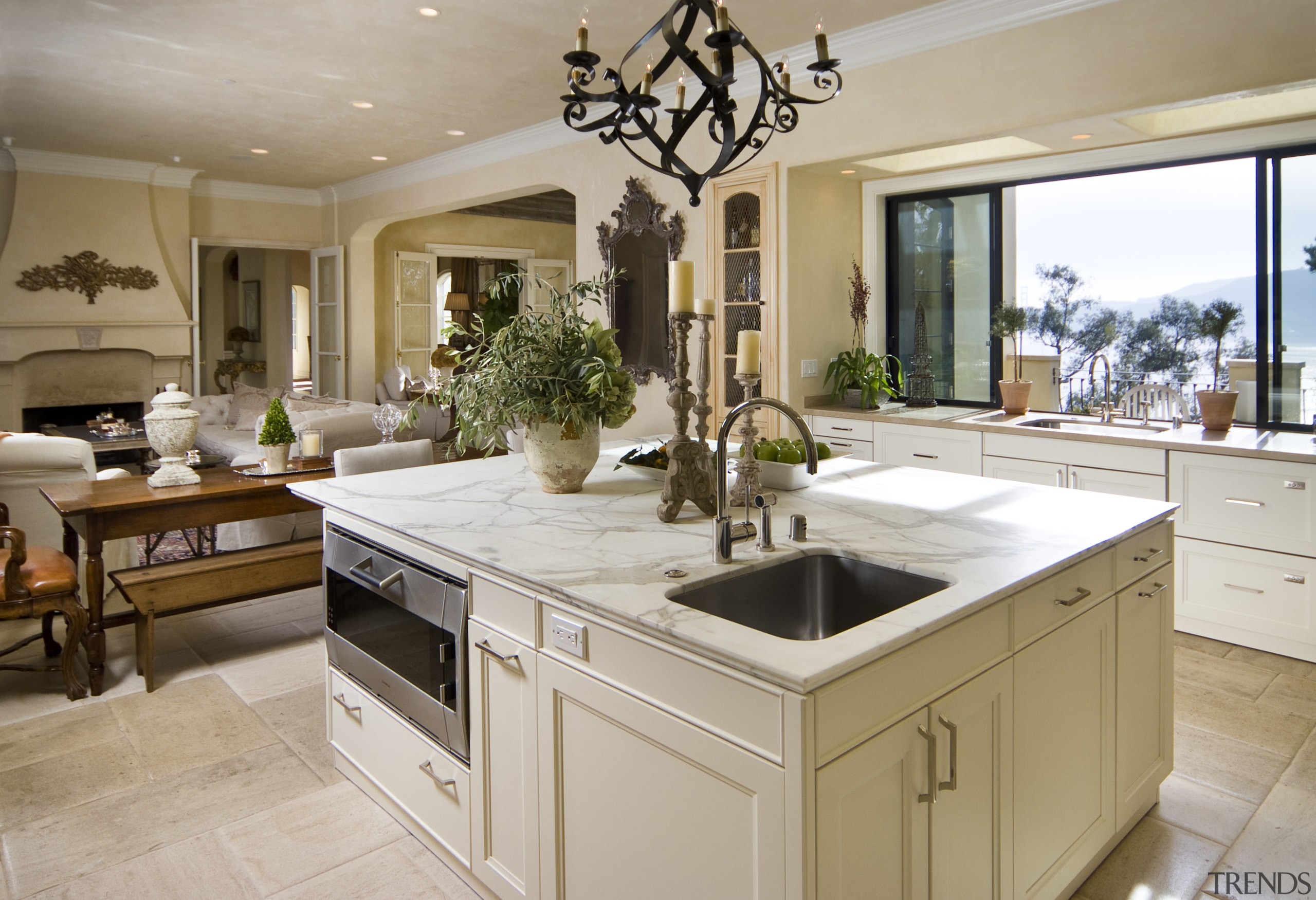 View of kitchen with square island, white cabinetry countertop, cuisine classique, estate, home, interior design, kitchen, gray, brown